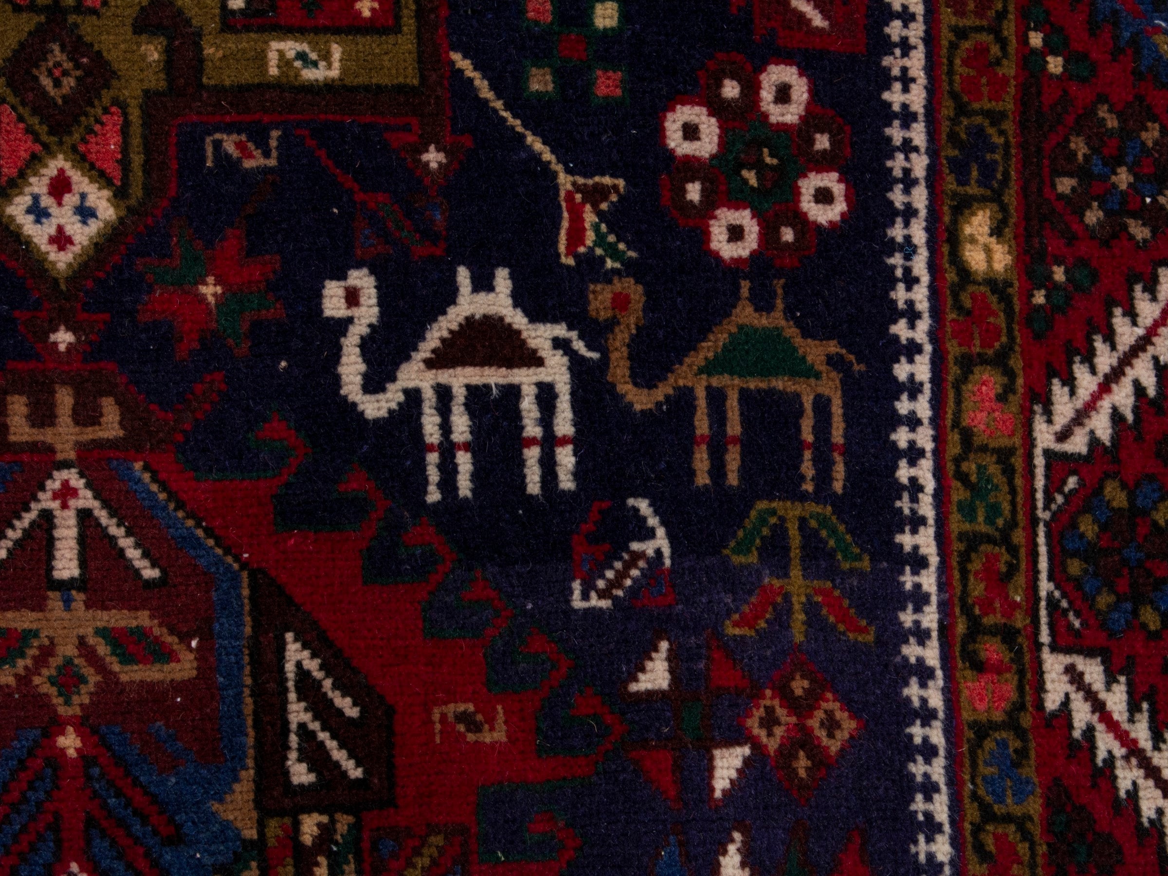 Persian Gharajeh runner rug in navy and burgundy, view 11 of 17
