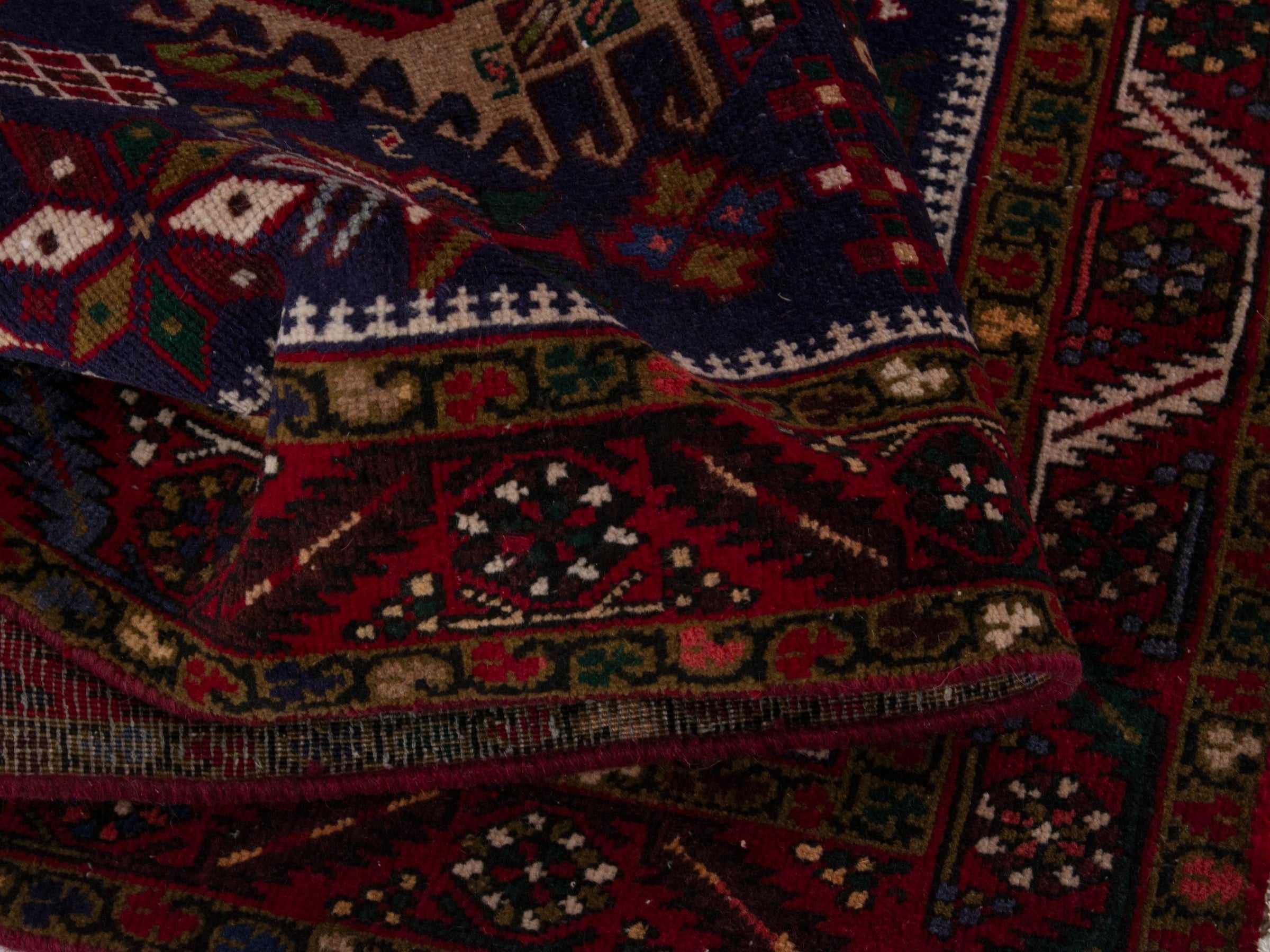 Persian Gharajeh runner rug in navy and burgundy, view 14 of 17