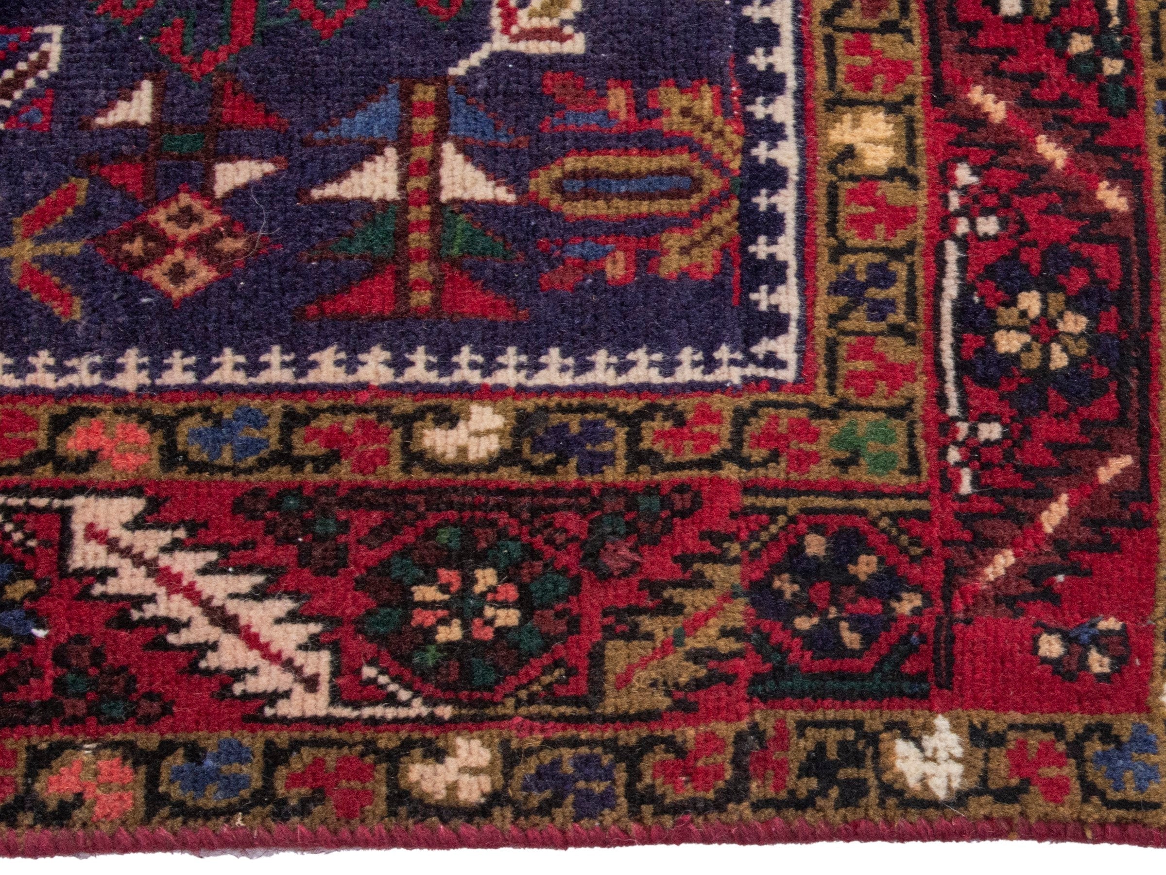 Persian Gharajeh runner rug in navy and burgundy, view 5 of 17
