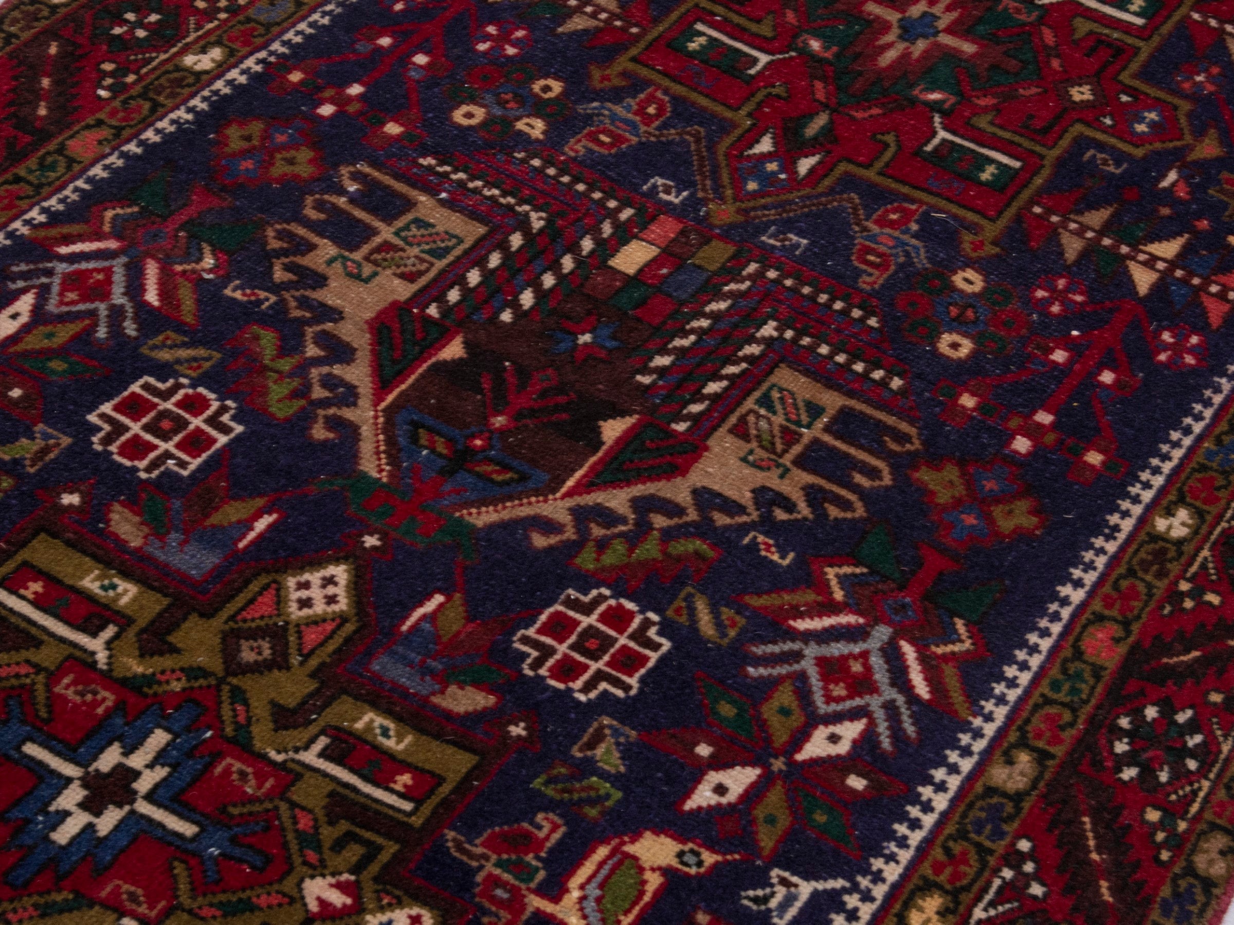 Persian Gharajeh runner rug in navy and burgundy, view 9 of 17