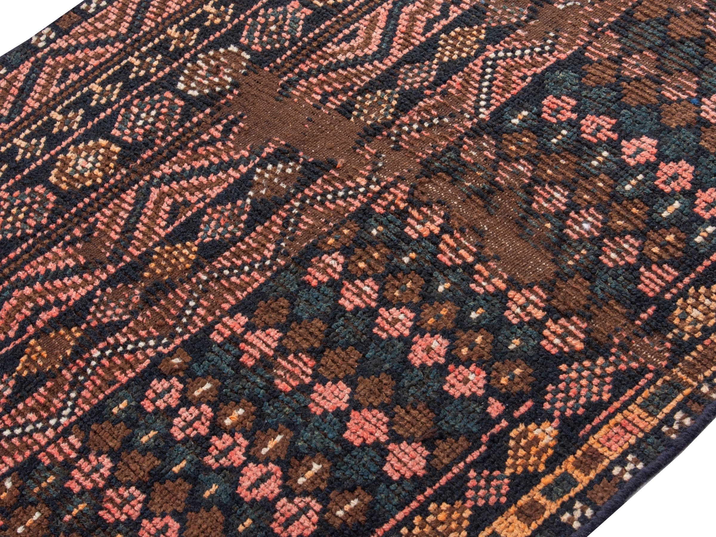 Persian Shiraz runner rug in dark brown and terracotta, view 4 of 17