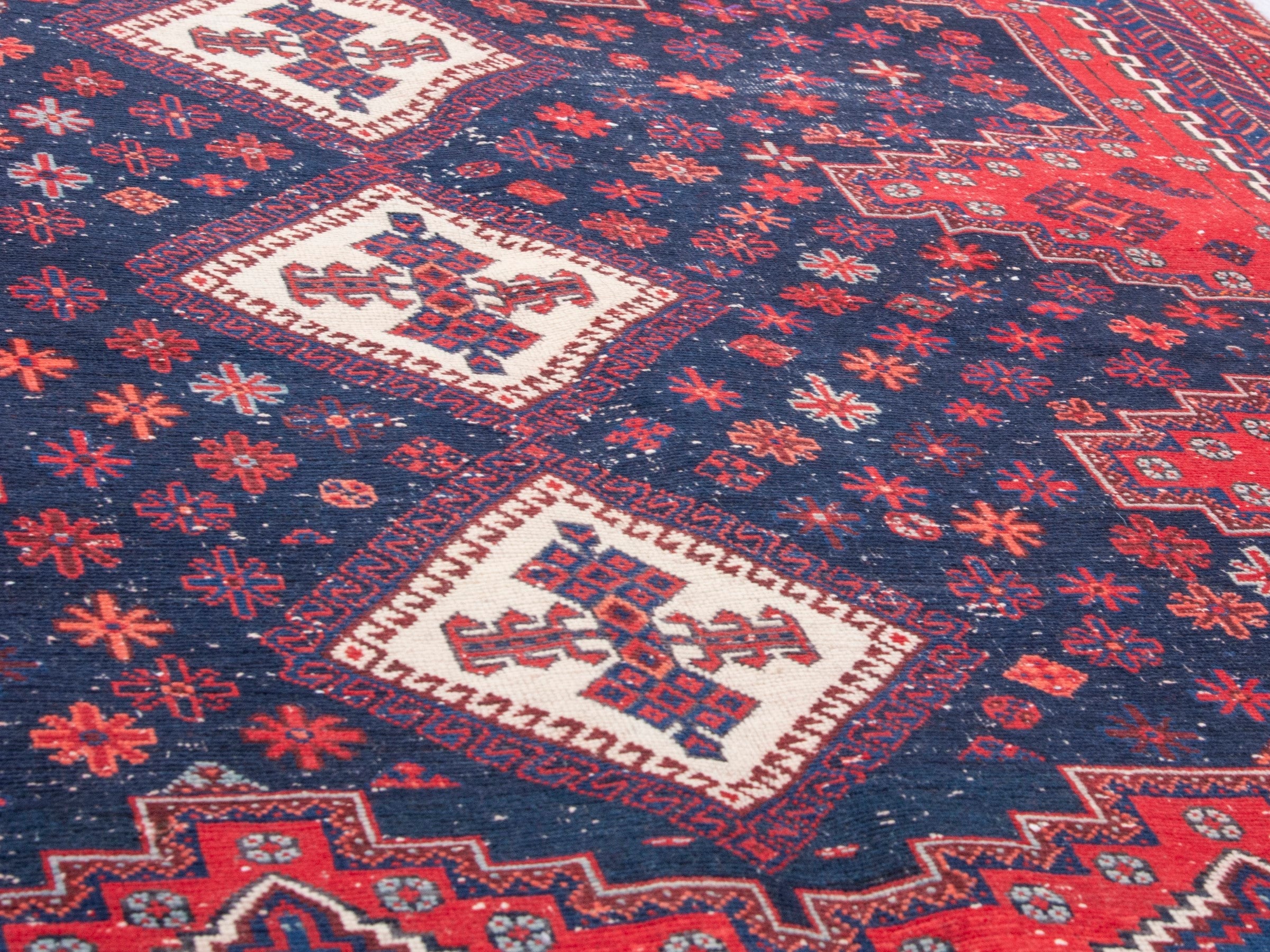 Persian Sirjan area rug in navy and deep red, view 10 of 19