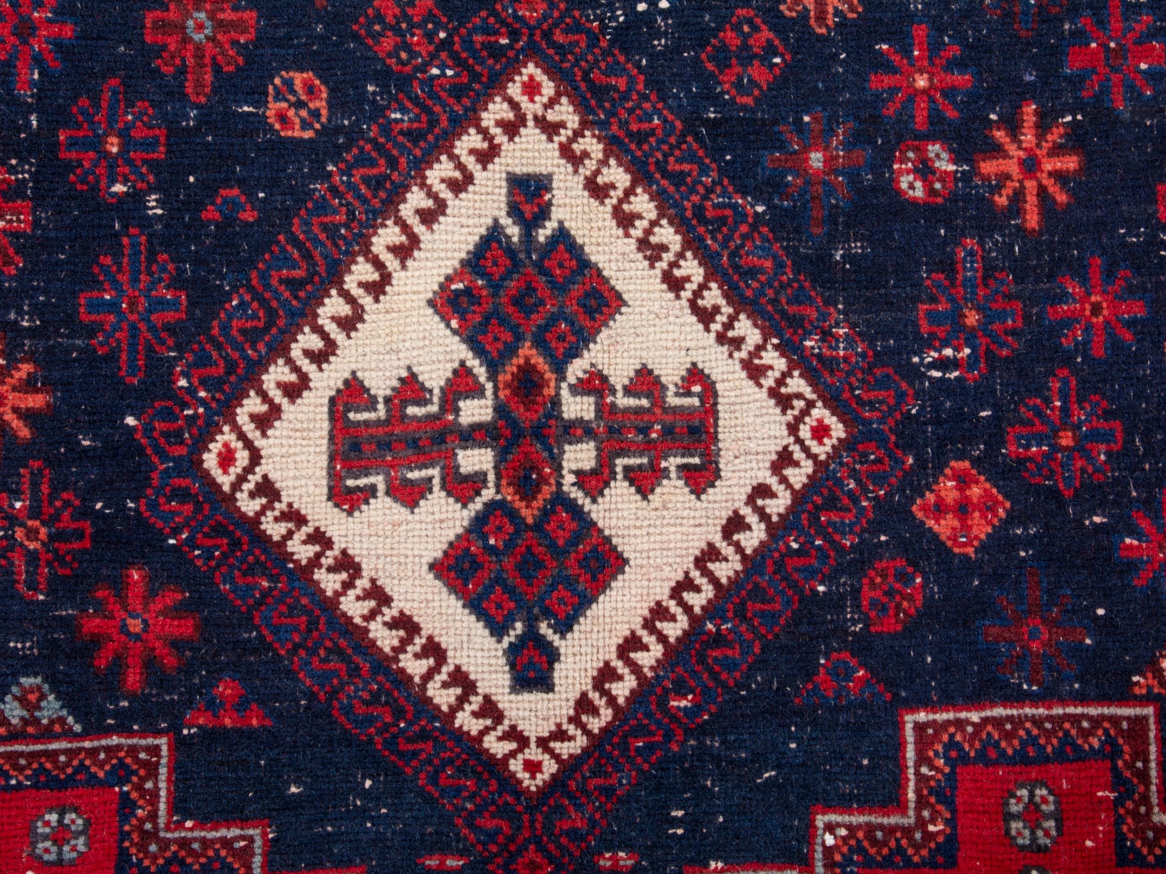 Persian Sirjan area rug in navy and deep red, view 12 of 19