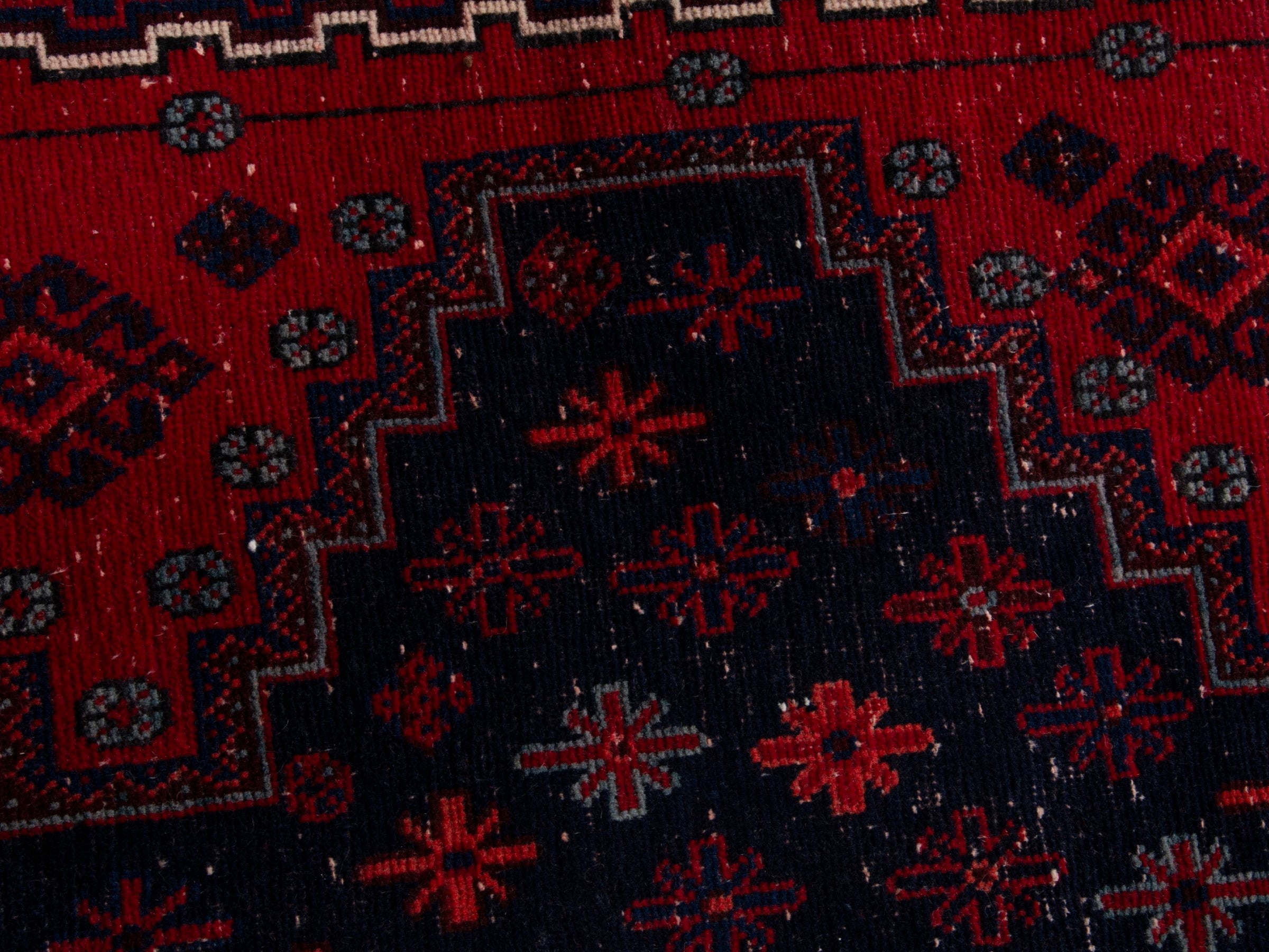 Persian Sirjan area rug in navy and deep red, view 13 of 19