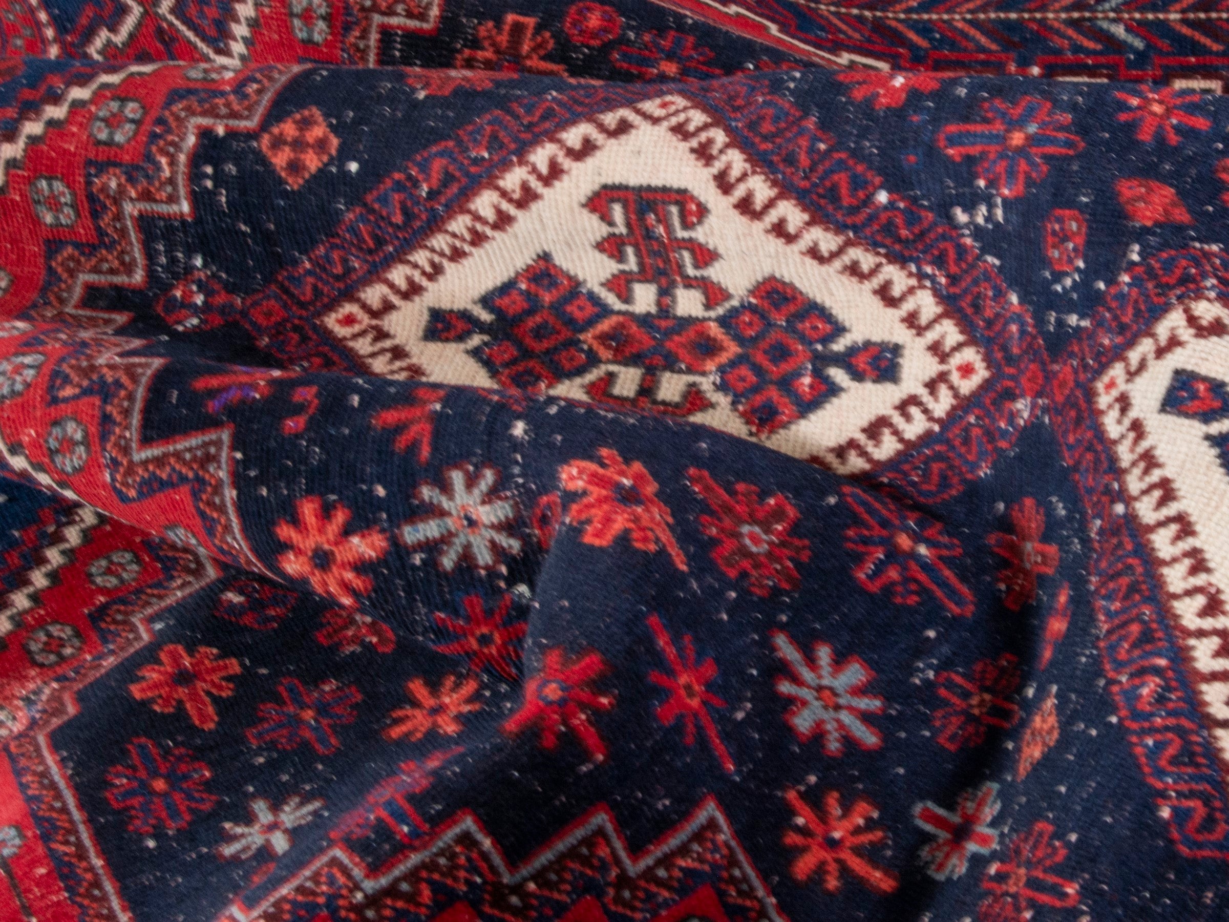 Persian Sirjan area rug in navy and deep red, view 17 of 19