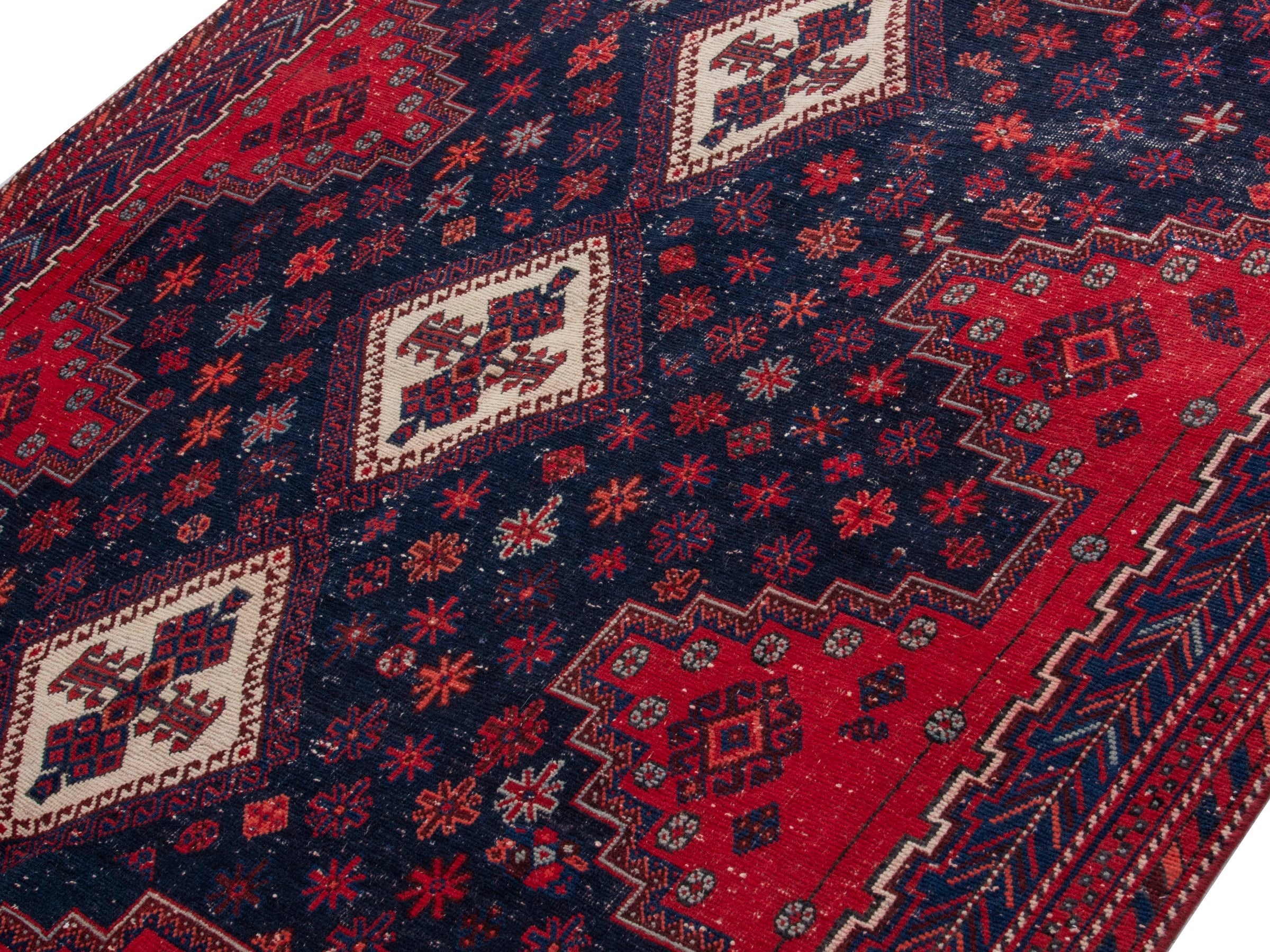 Persian Sirjan area rug in navy and deep red, view 4 of 19