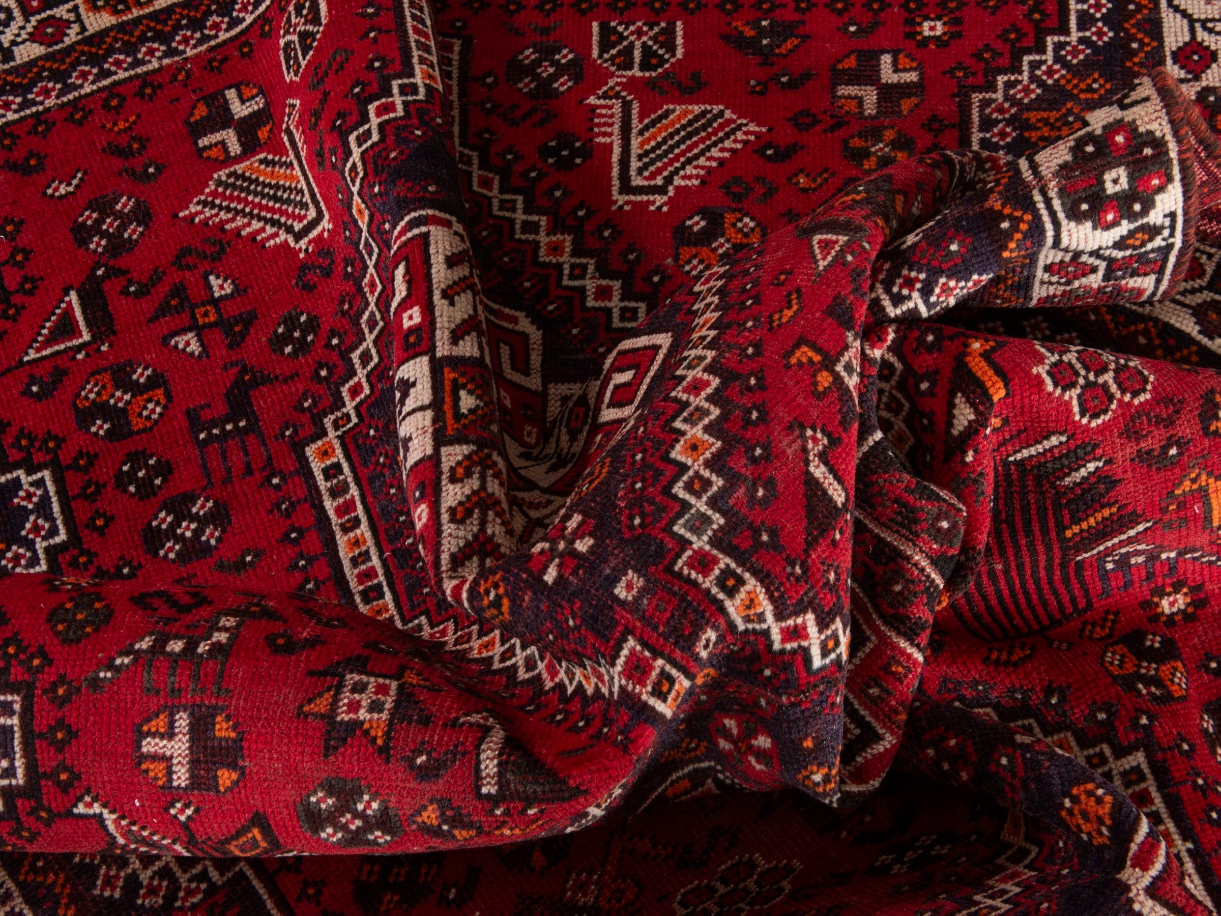 Persian Shiraz area rug in deep red and cream, view 17 of 19