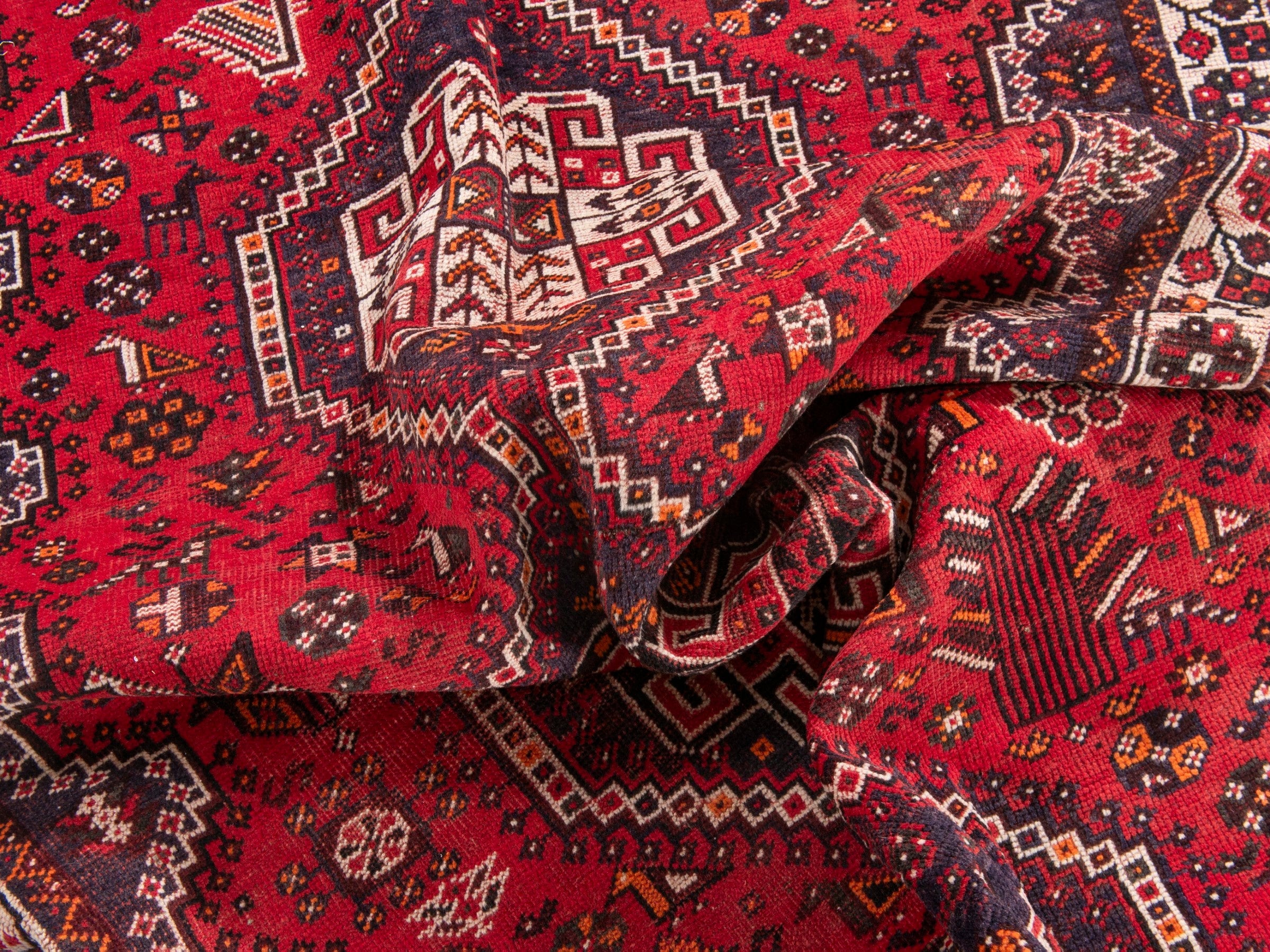 Persian Shiraz area rug in deep red and cream, view 18 of 19