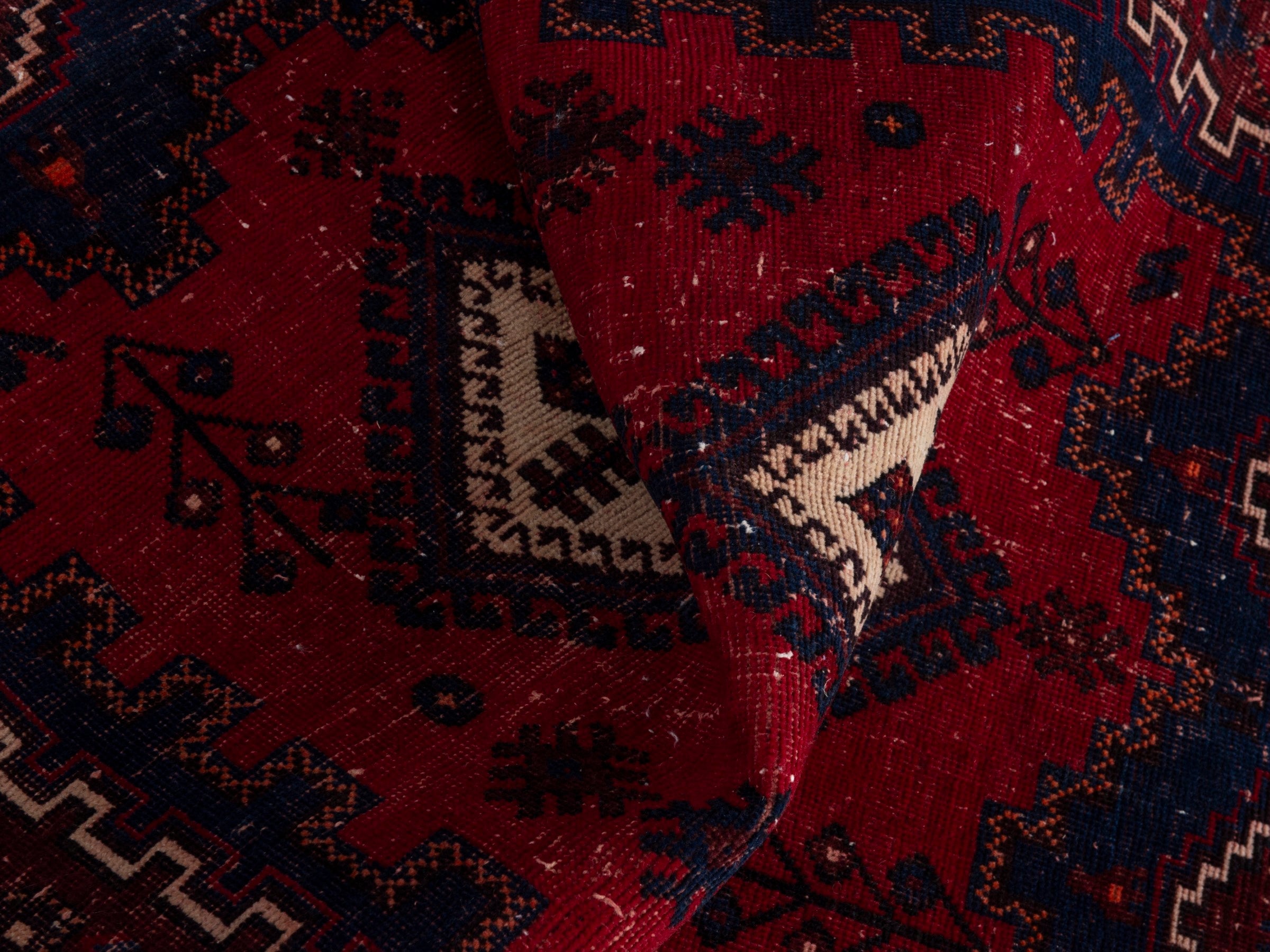 Persian Sirjan accent rug in deep red and navy, view 18 of 19