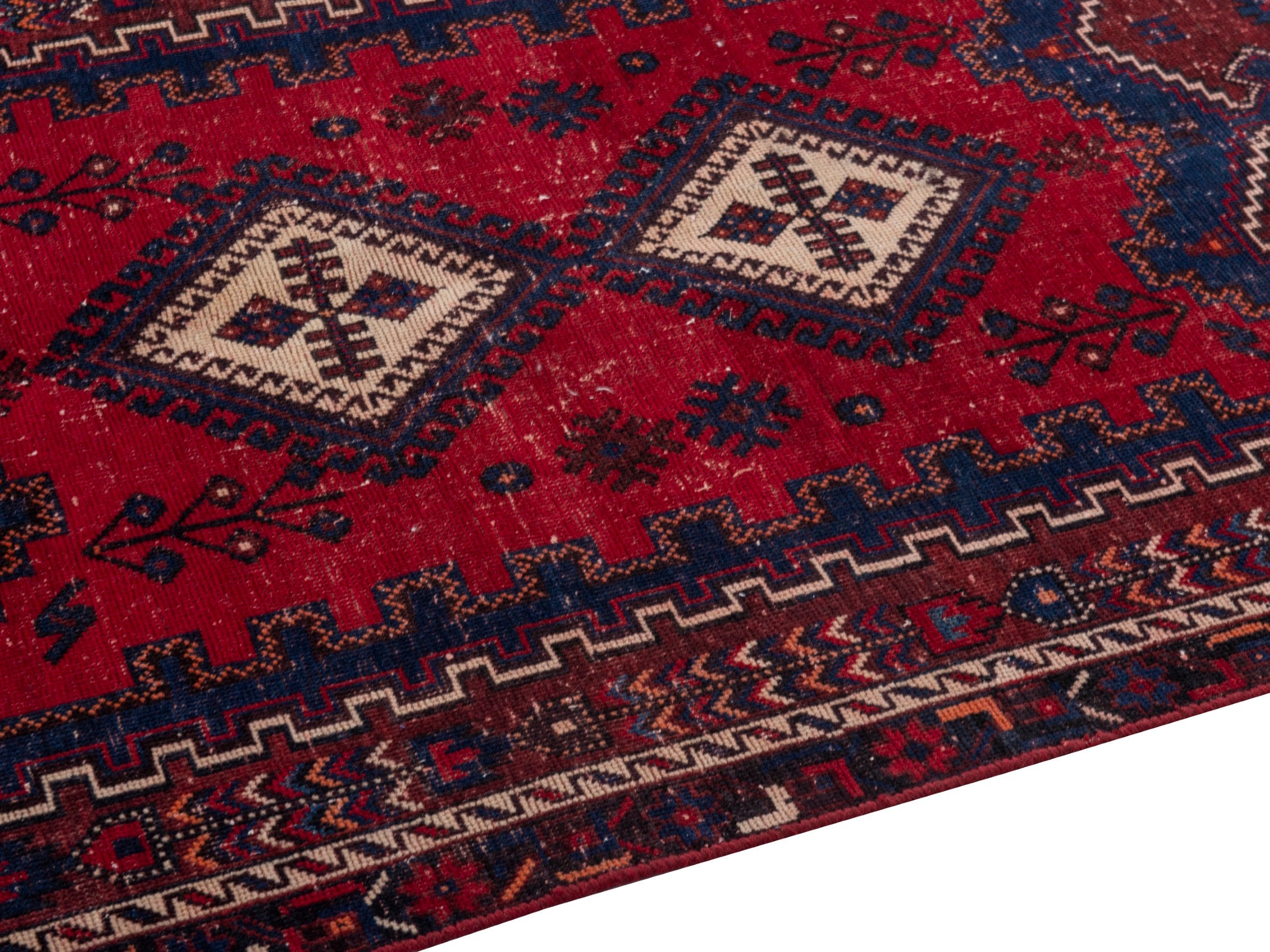 Persian Sirjan accent rug in deep red and navy, view 8 of 19