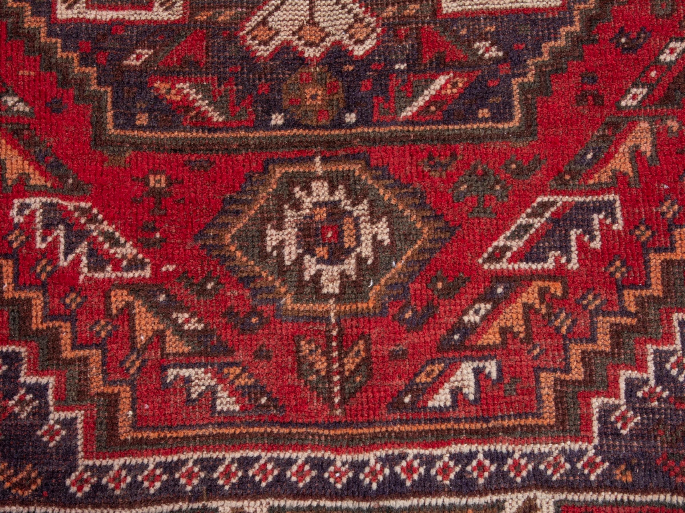 Persian Shiraz area rug in deep red and burgundy, view 11 of 17