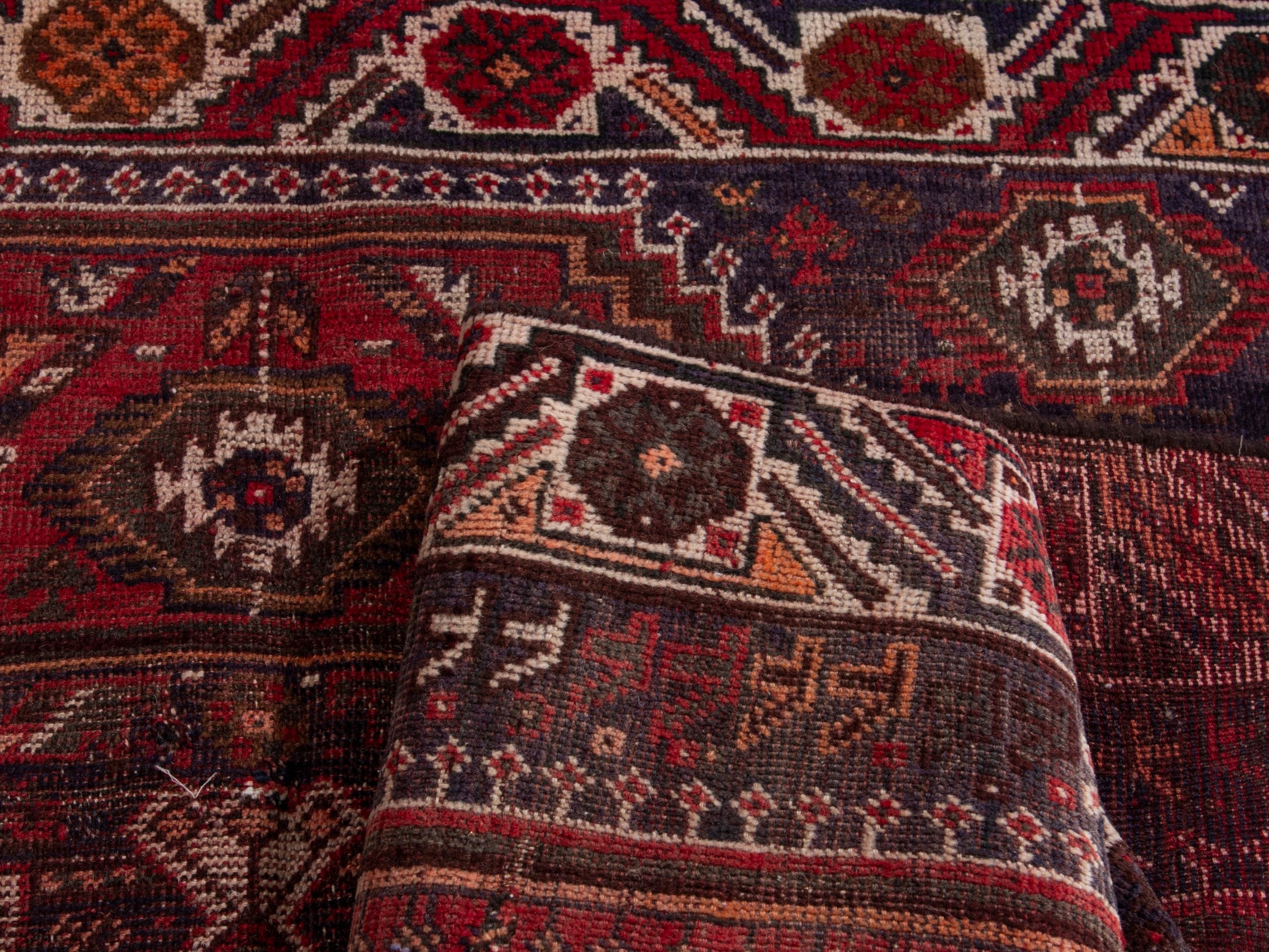 Persian Shiraz area rug in deep red and burgundy, view 14 of 17