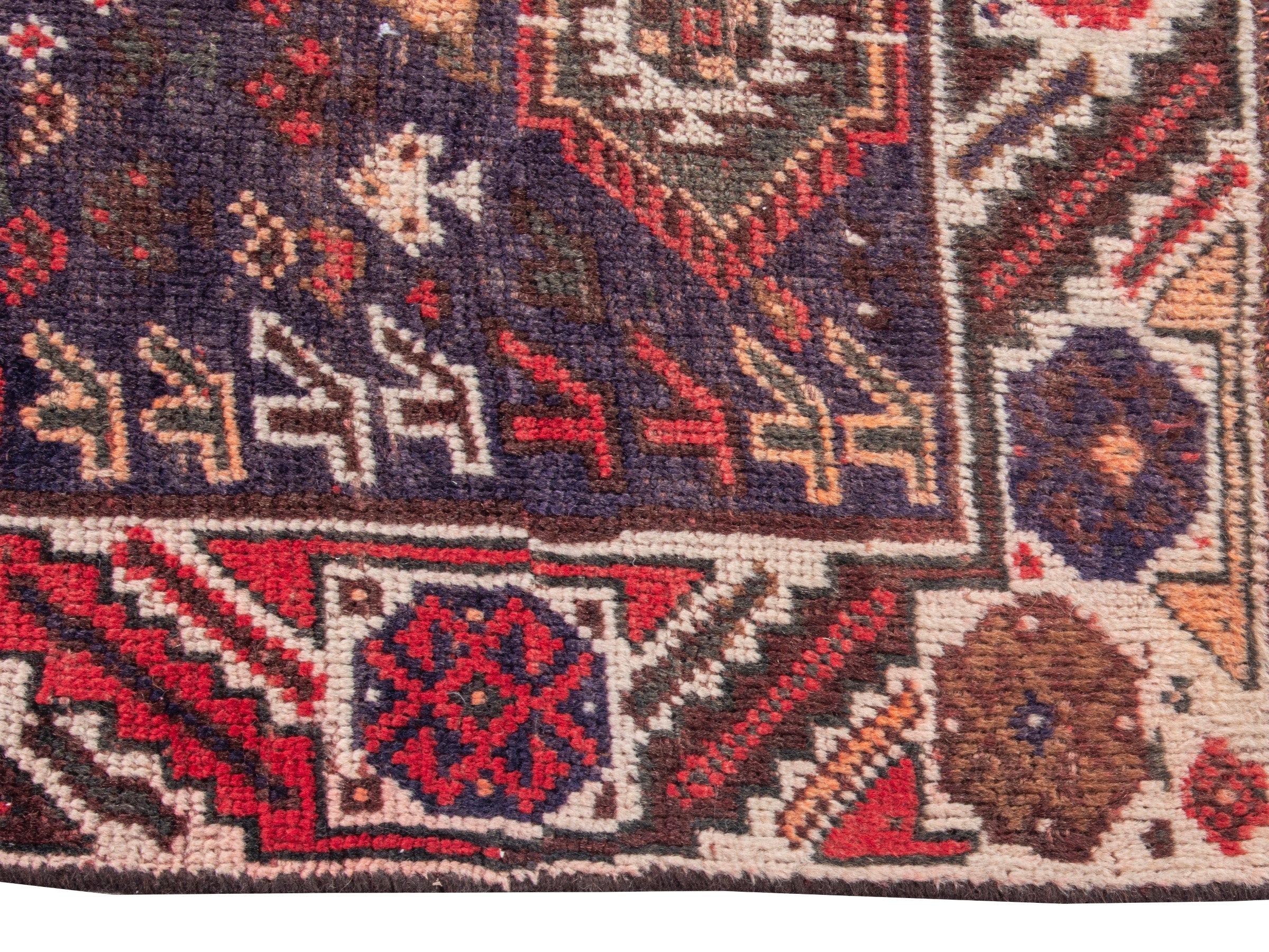 Persian Shiraz area rug in deep red and burgundy, view 5 of 17