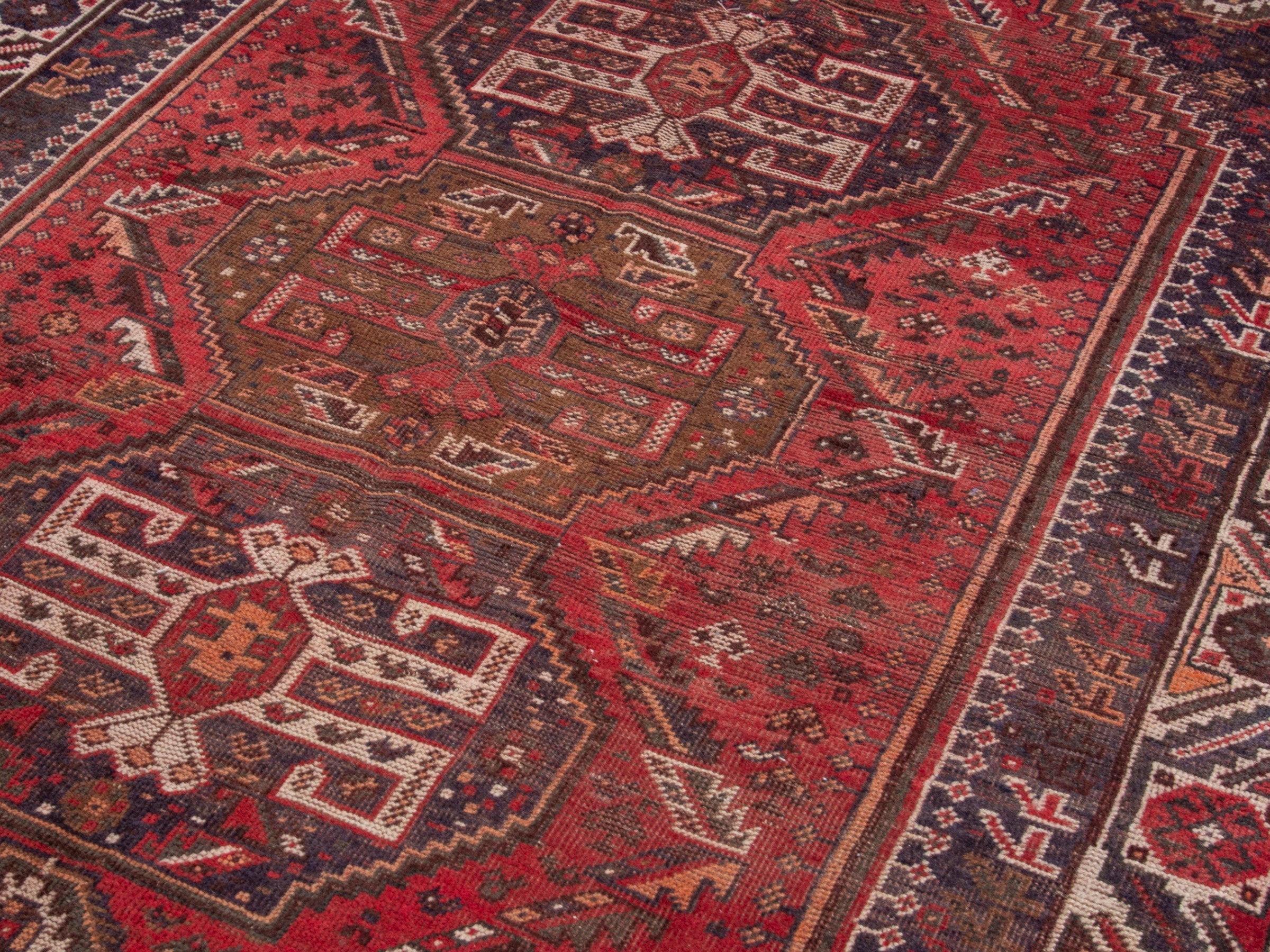 Persian Shiraz area rug in deep red and burgundy, view 10 of 17