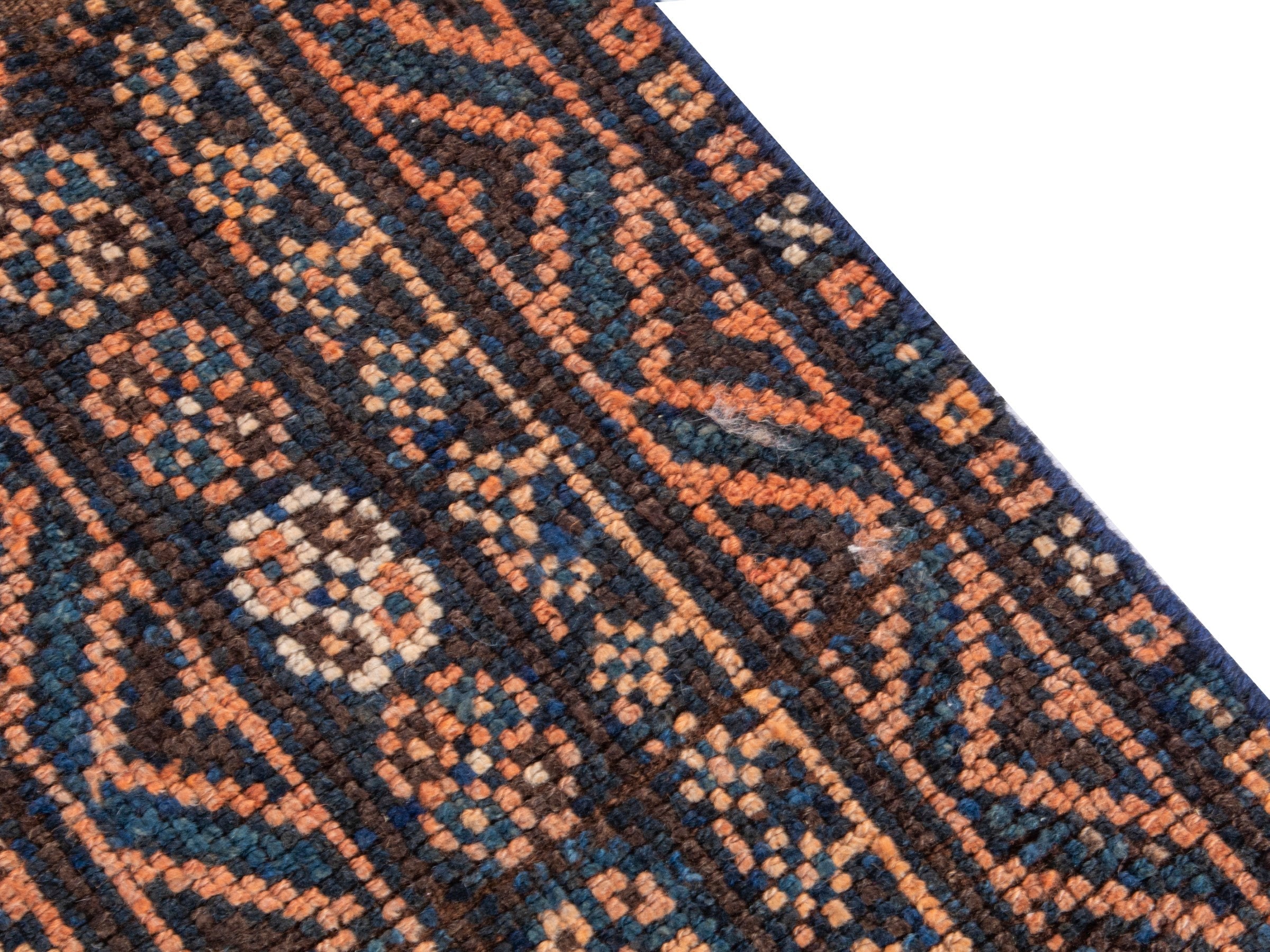 Persian Shiraz runner rug in navy and rust, view 7 of 18