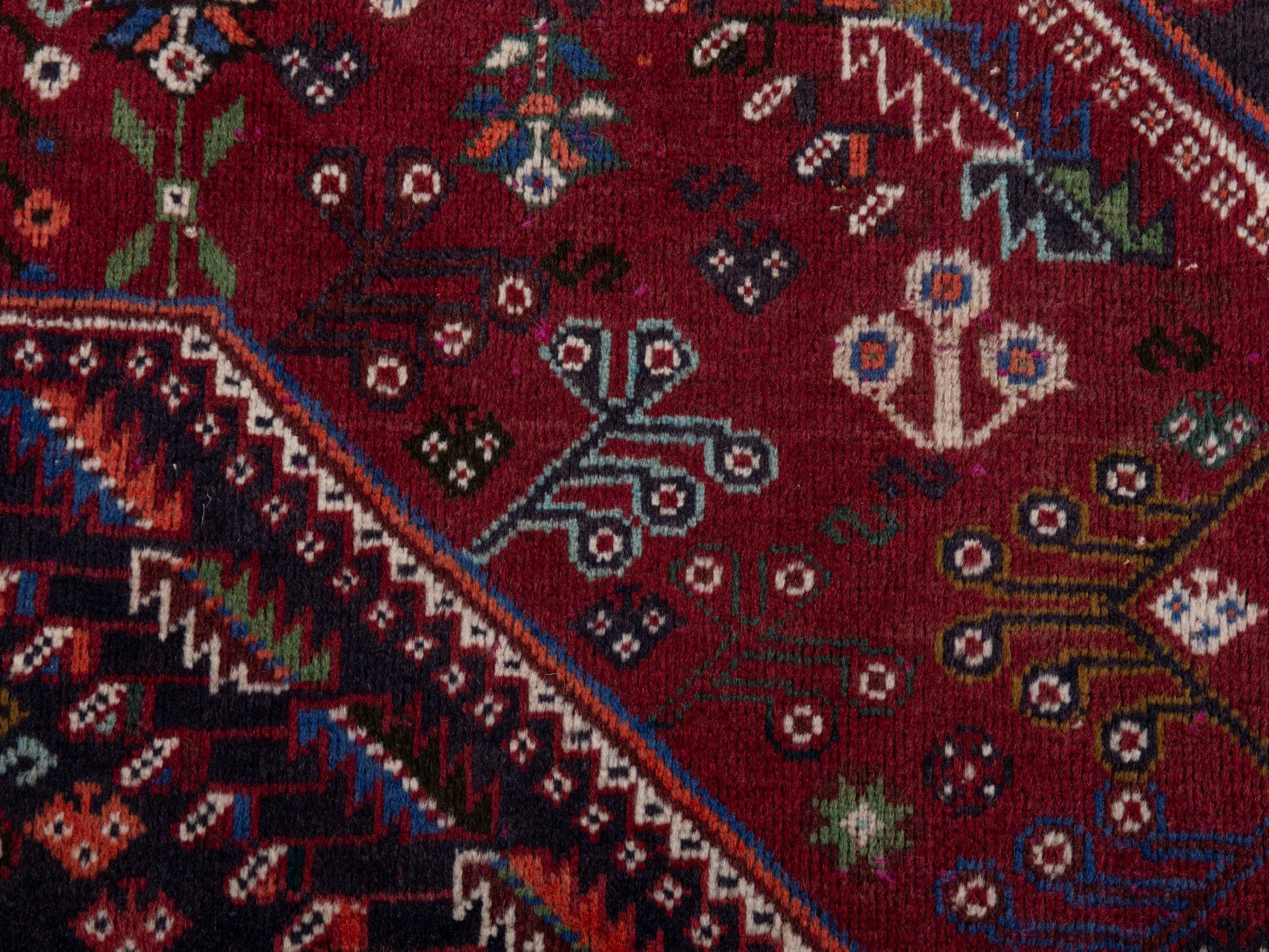 Persian Shiraz area rug in burgundy and deep red, view 12 of 20