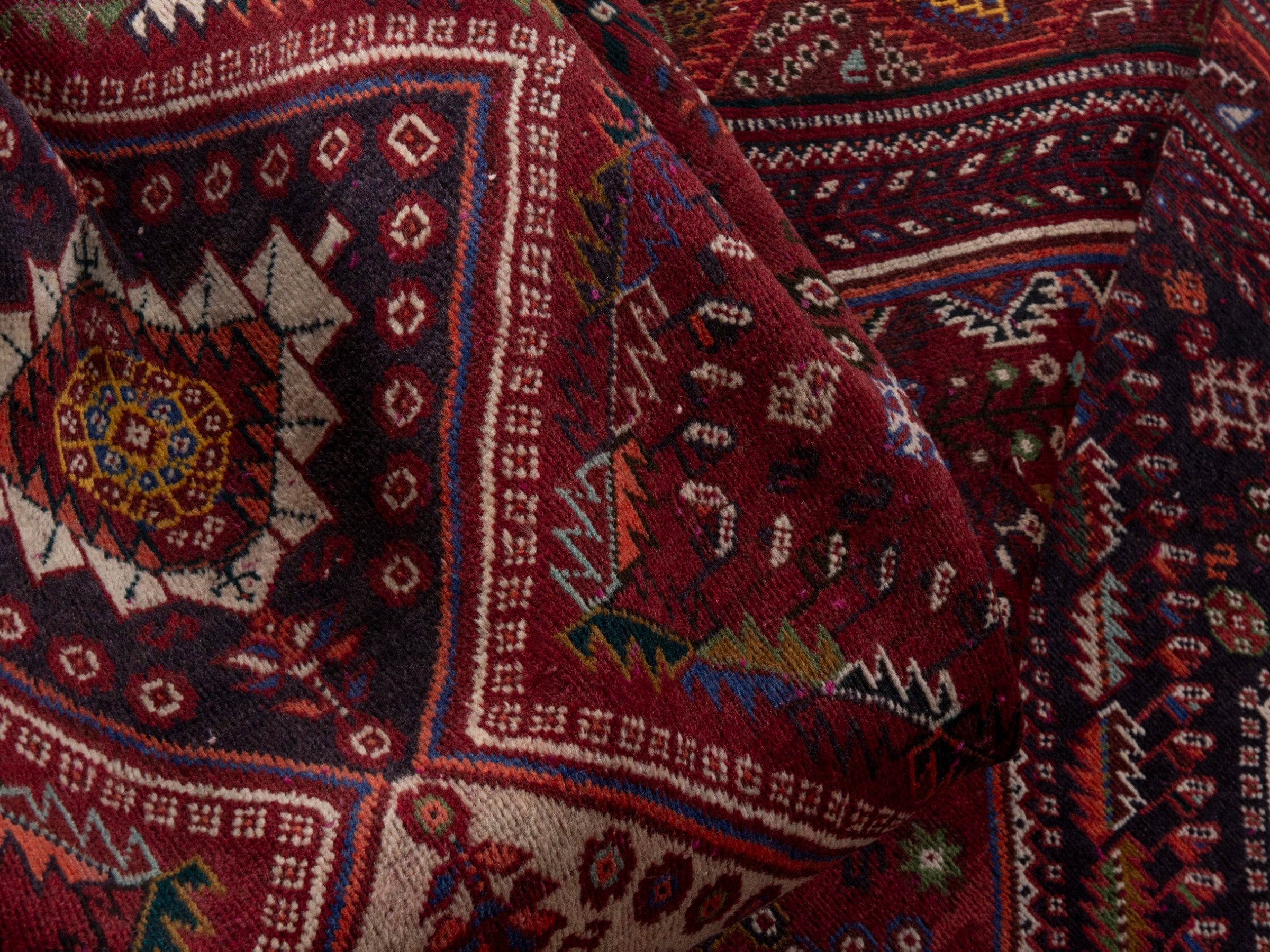 Persian Shiraz area rug in burgundy and deep red, view 16 of 20
