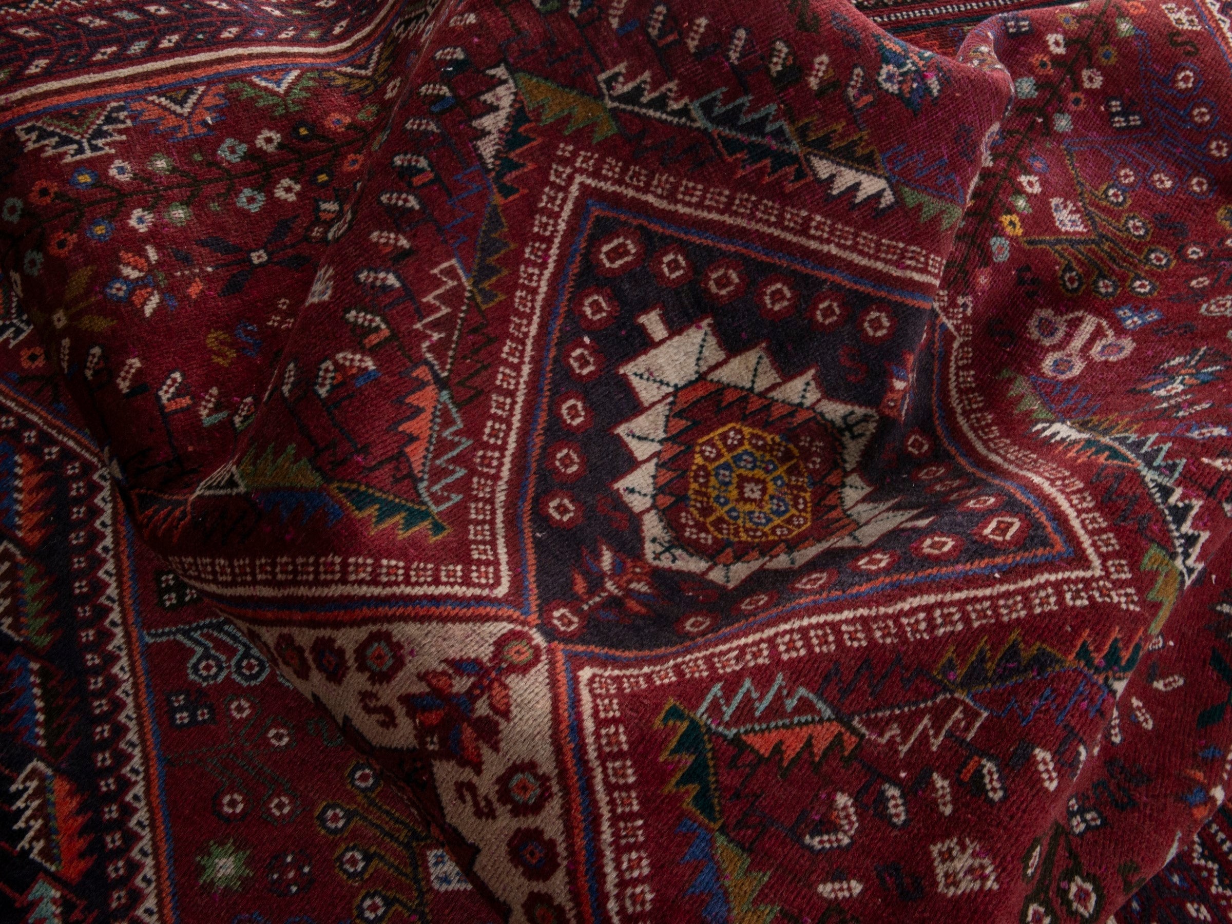 Persian Shiraz area rug in burgundy and deep red, view 17 of 20