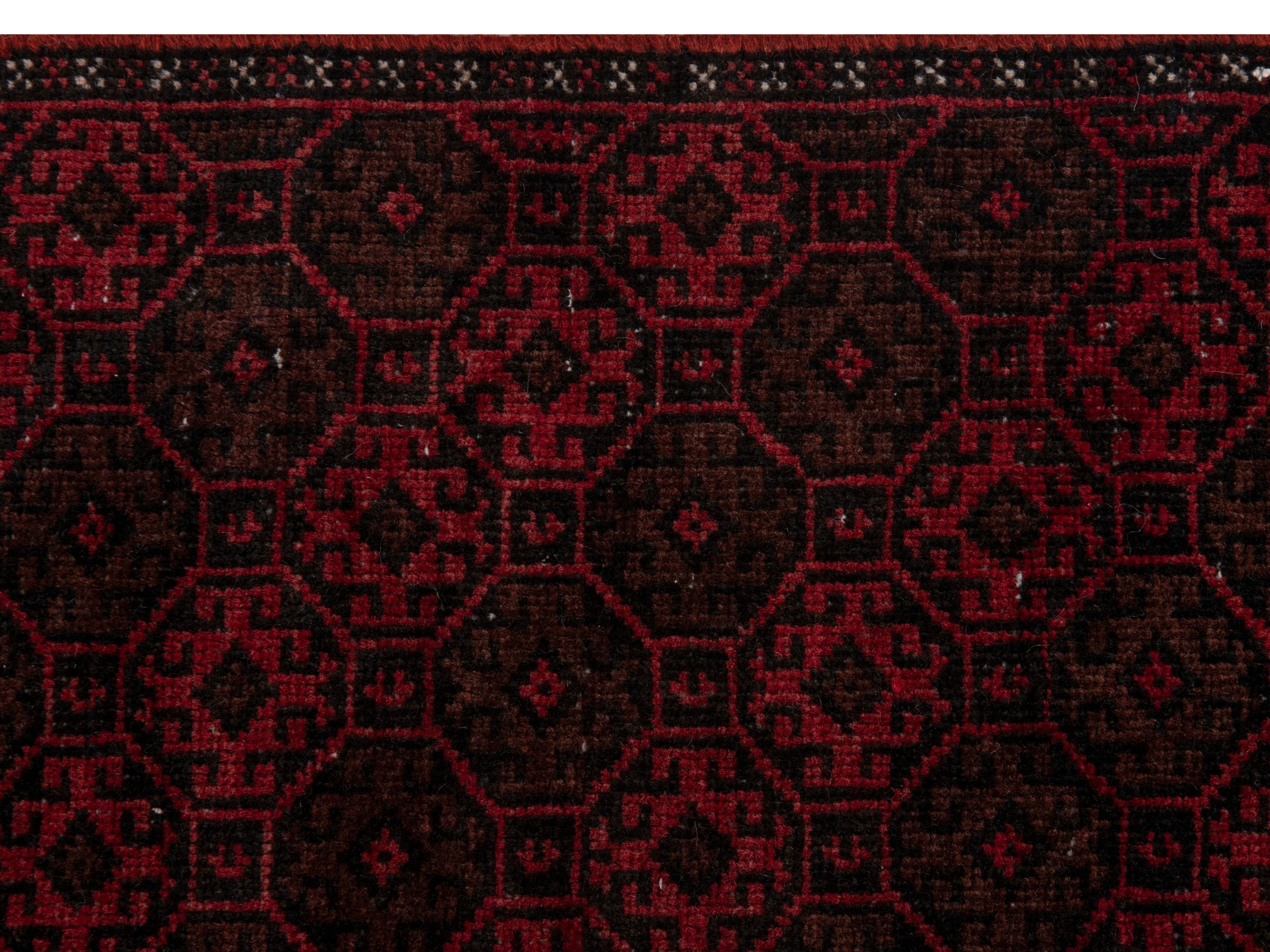 Persian Baluch accent rug in burgundy and faded red, view 14 of 18