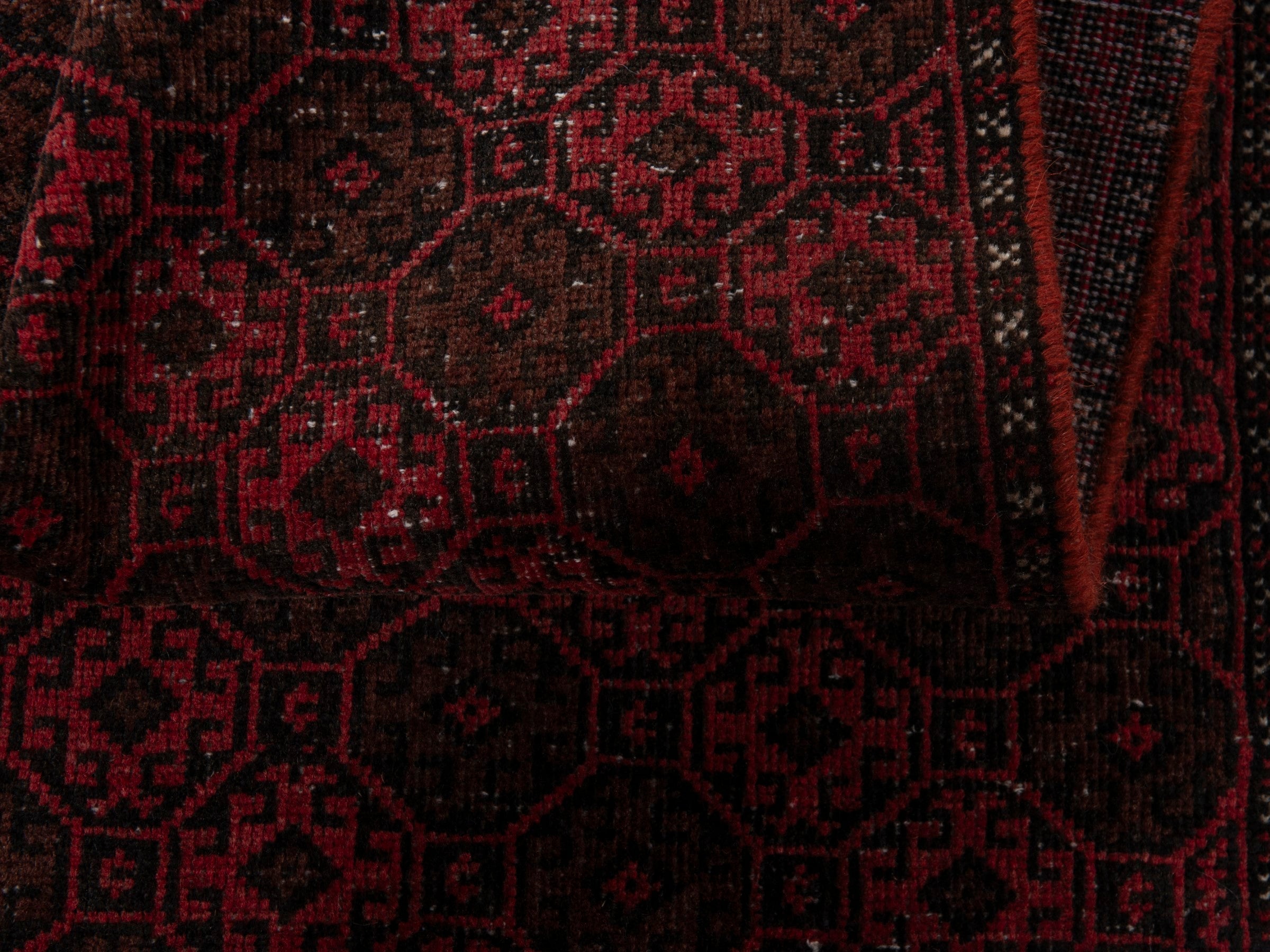 Persian Baluch accent rug in burgundy and faded red, view 15 of 18