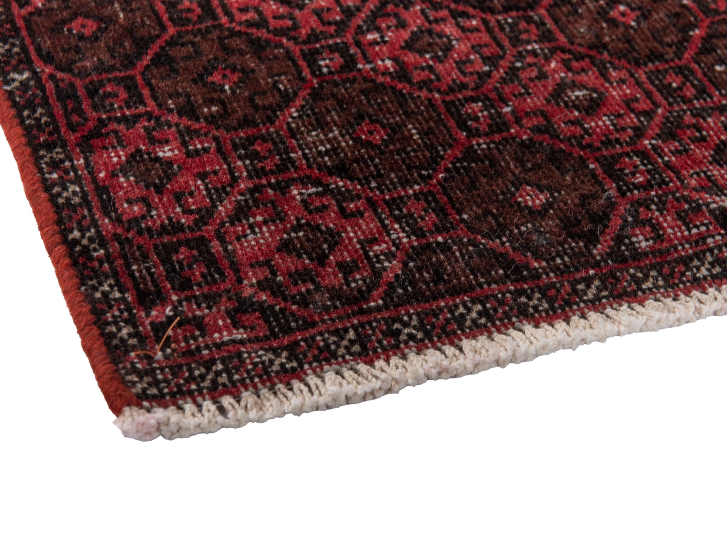 Persian Baluch accent rug in burgundy and faded red, view 6 of 18