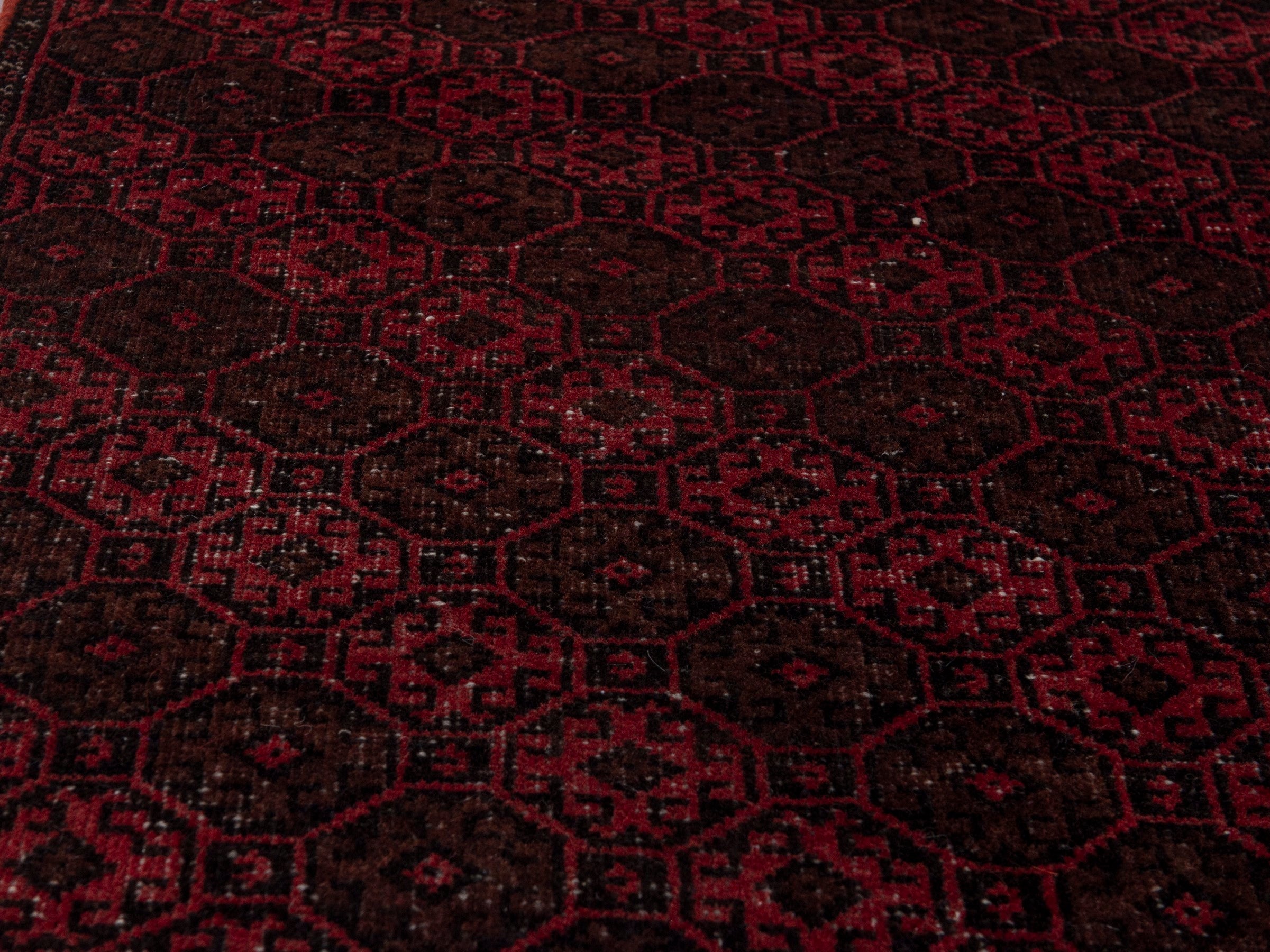 Persian Baluch accent rug in burgundy and faded red, view 10 of 18