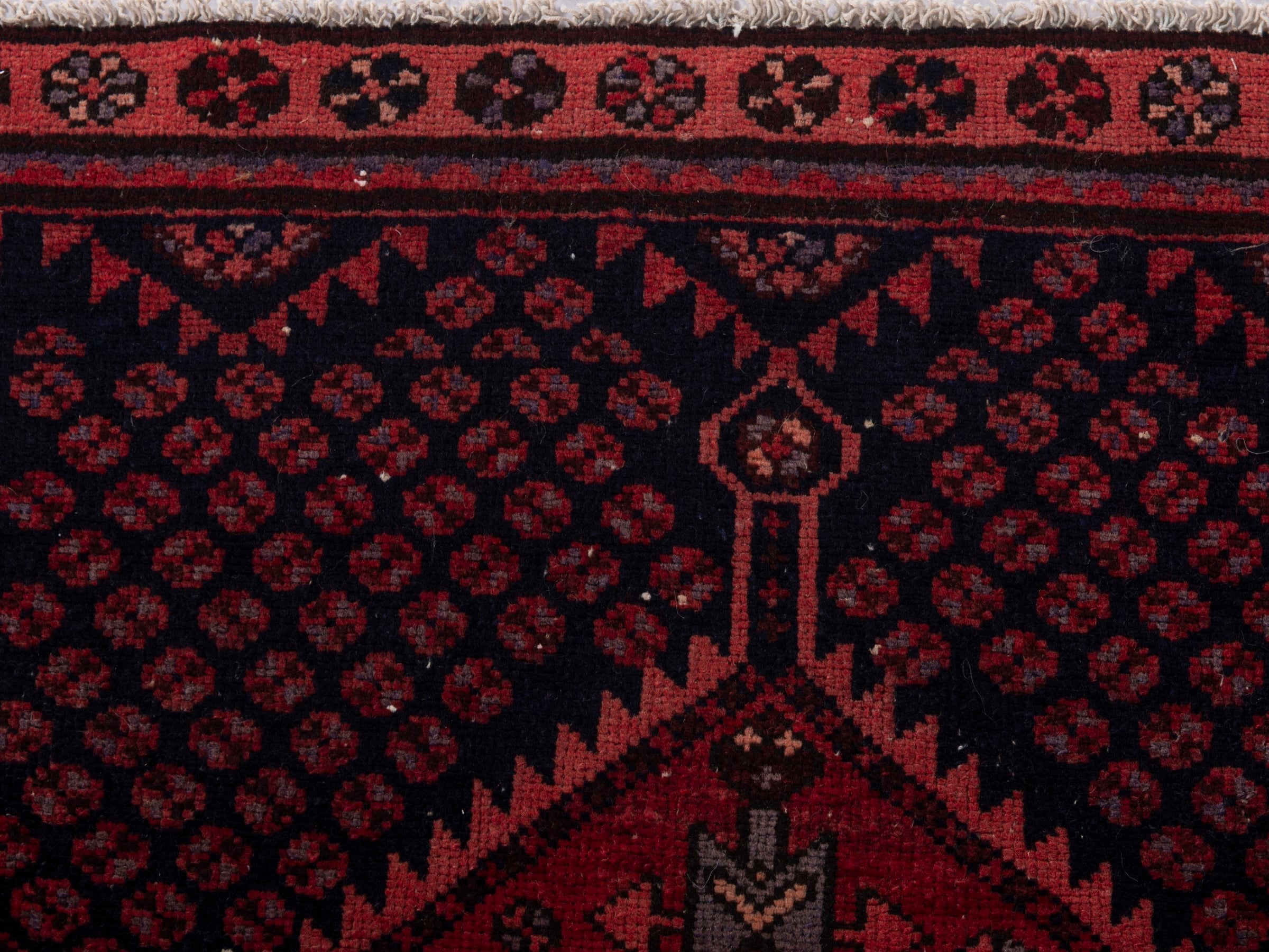 Persian Zanjan accent rug in navy and rust, view 12 of 17