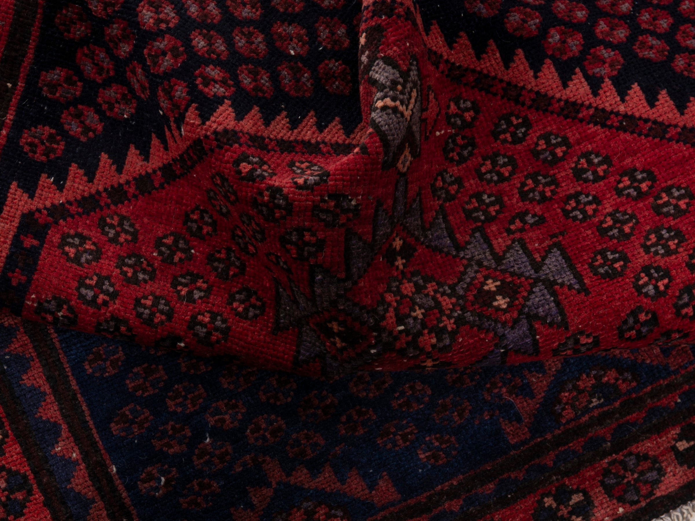 Persian Zanjan accent rug in navy and rust, view 14 of 17