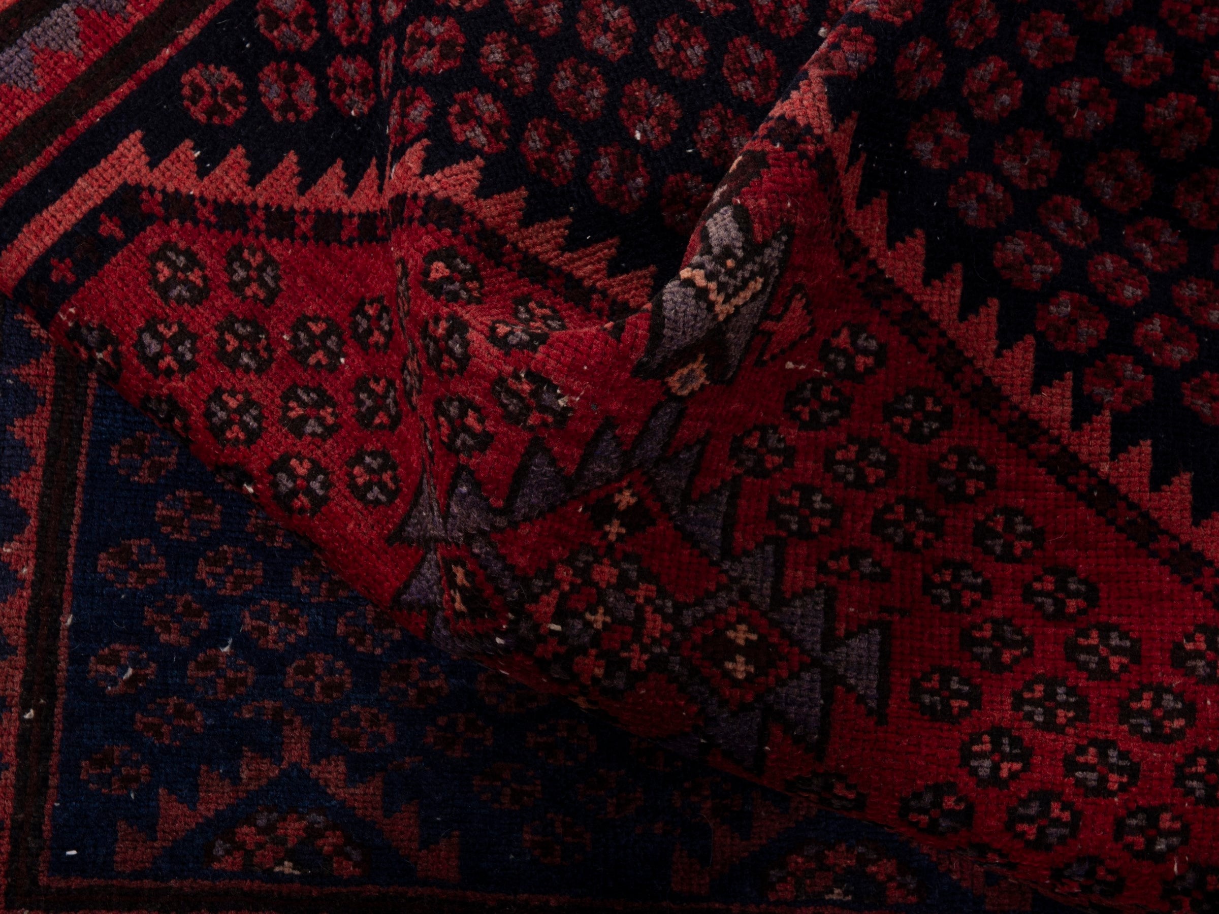 Persian Zanjan accent rug in navy and rust, view 16 of 17