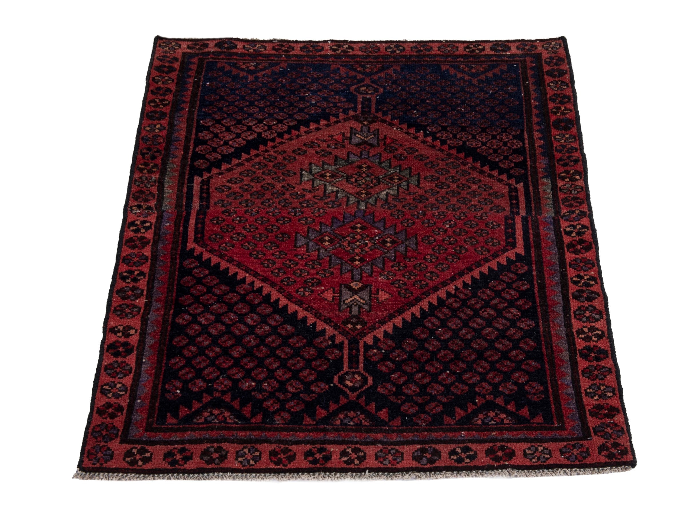Persian Zanjan accent rug in navy and rust, view 2 of 17