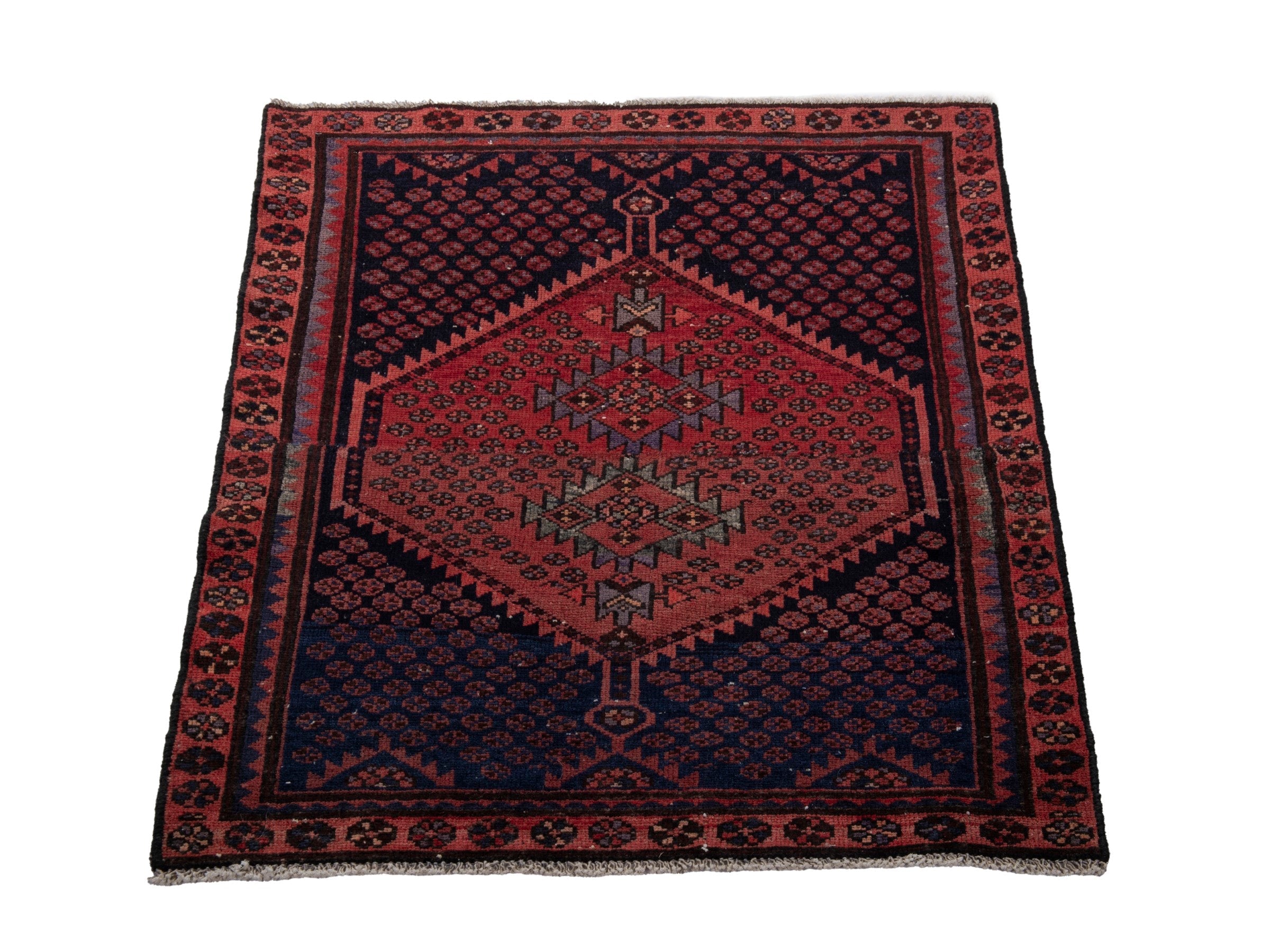 Persian Zanjan accent rug in navy and rust, view 3 of 17