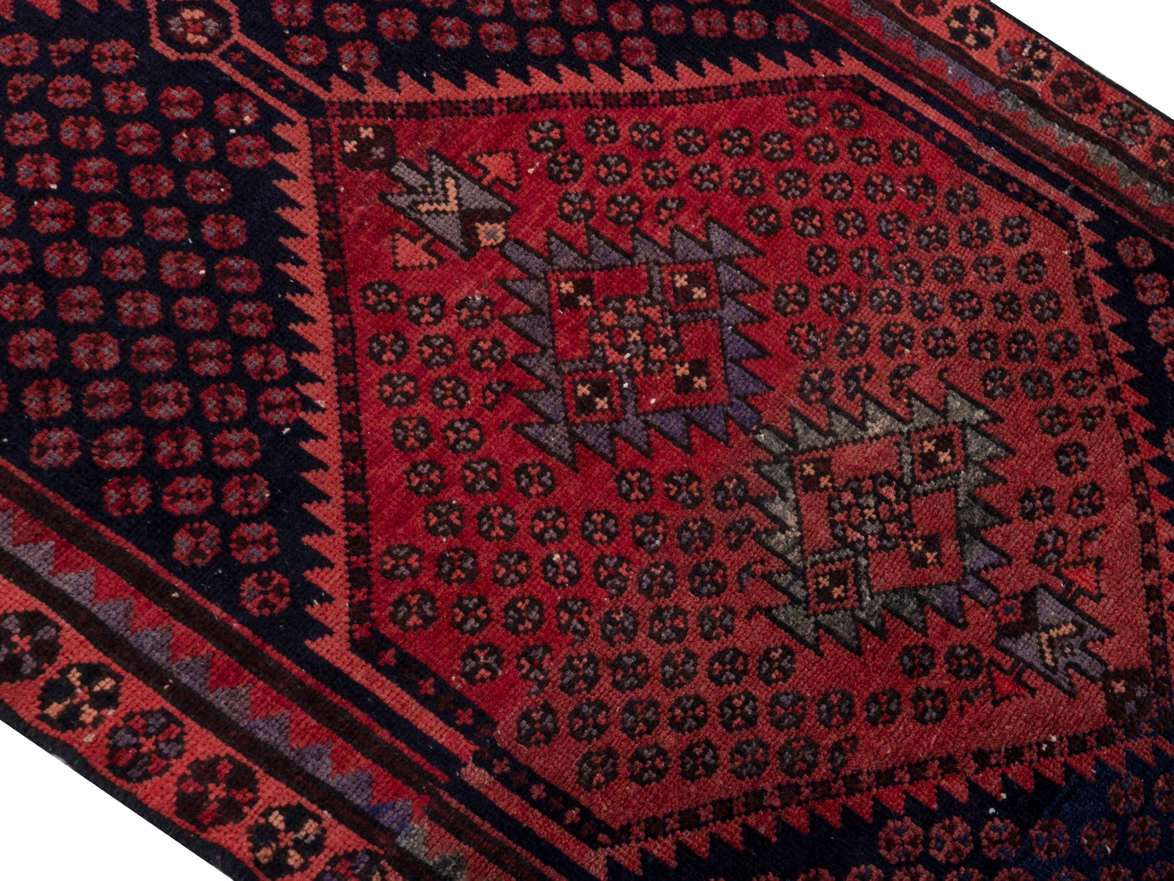 Persian Zanjan accent rug in navy and rust, view 4 of 17