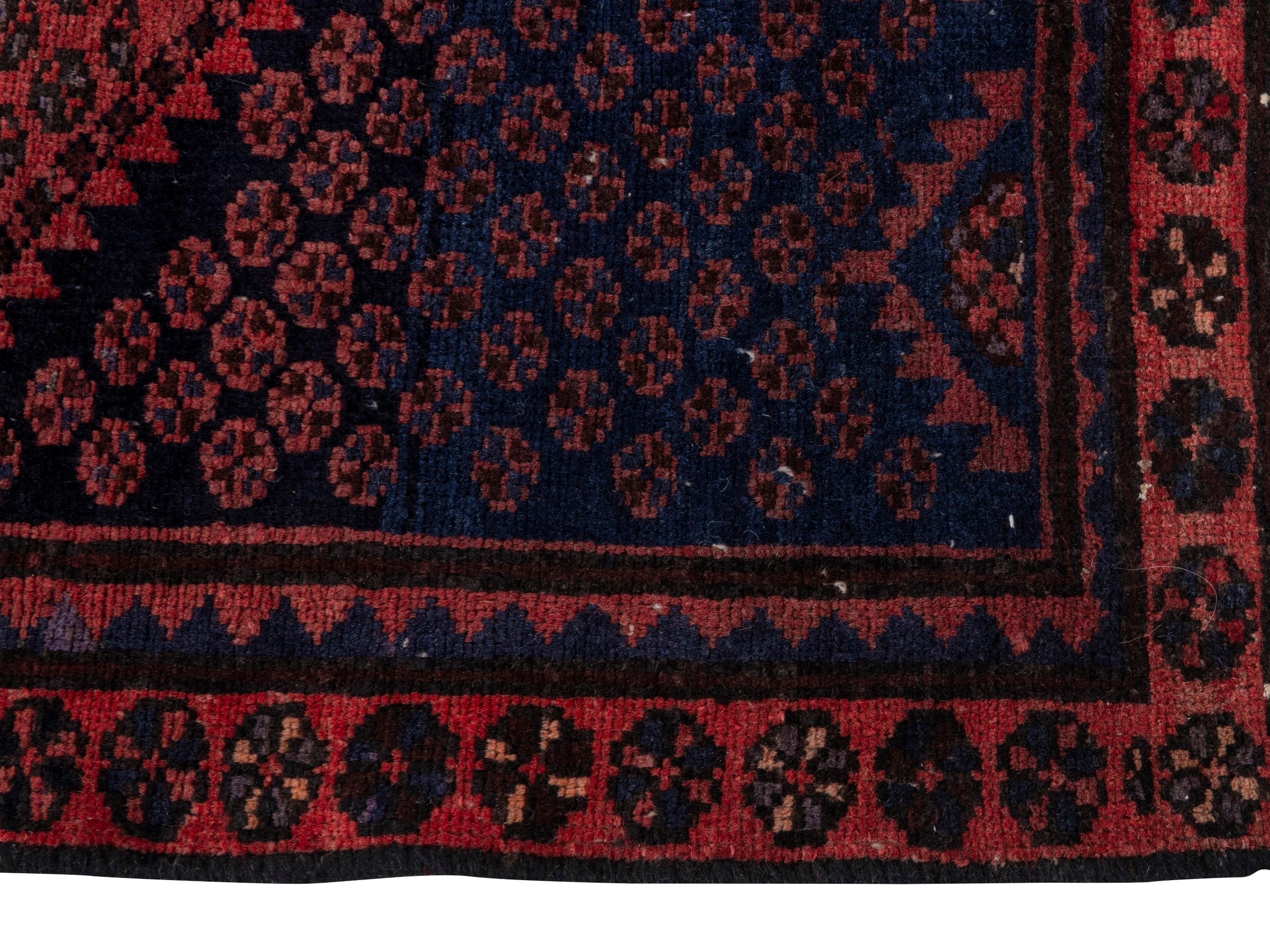 Persian Zanjan accent rug in navy and rust, view 5 of 17
