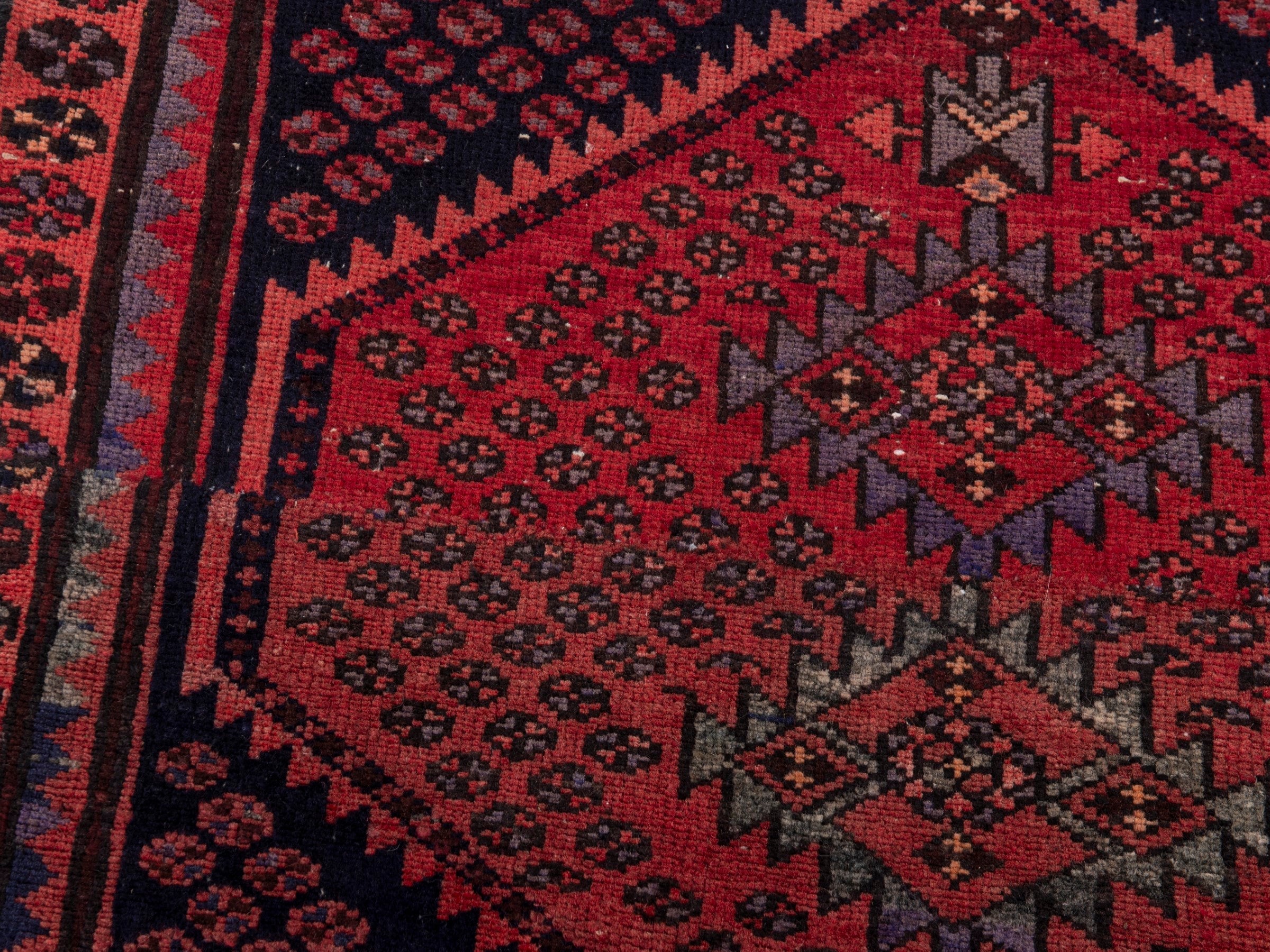 Persian Zanjan accent rug in navy and rust, view 7 of 17