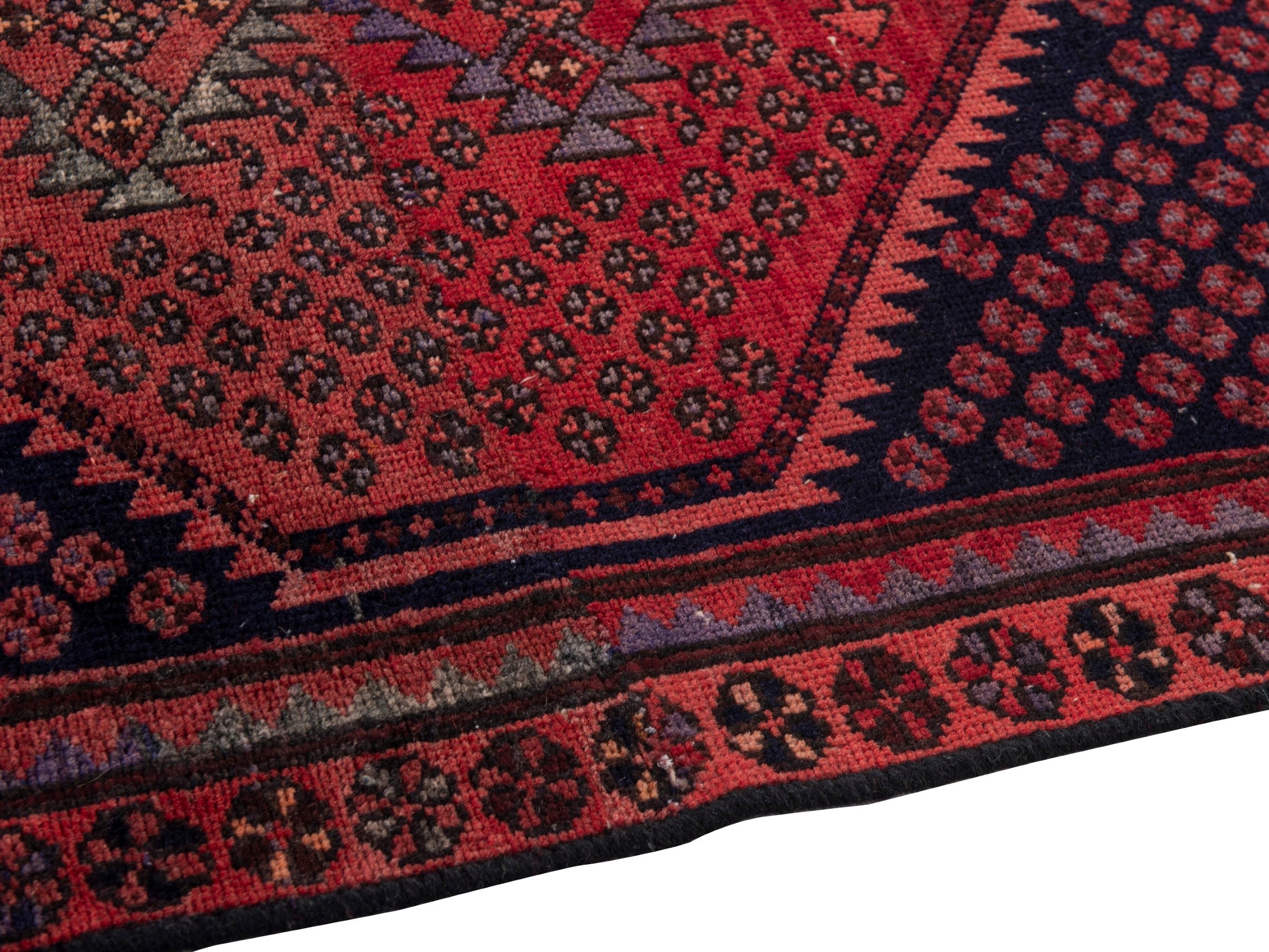 Persian Zanjan accent rug in navy and rust, view 8 of 17