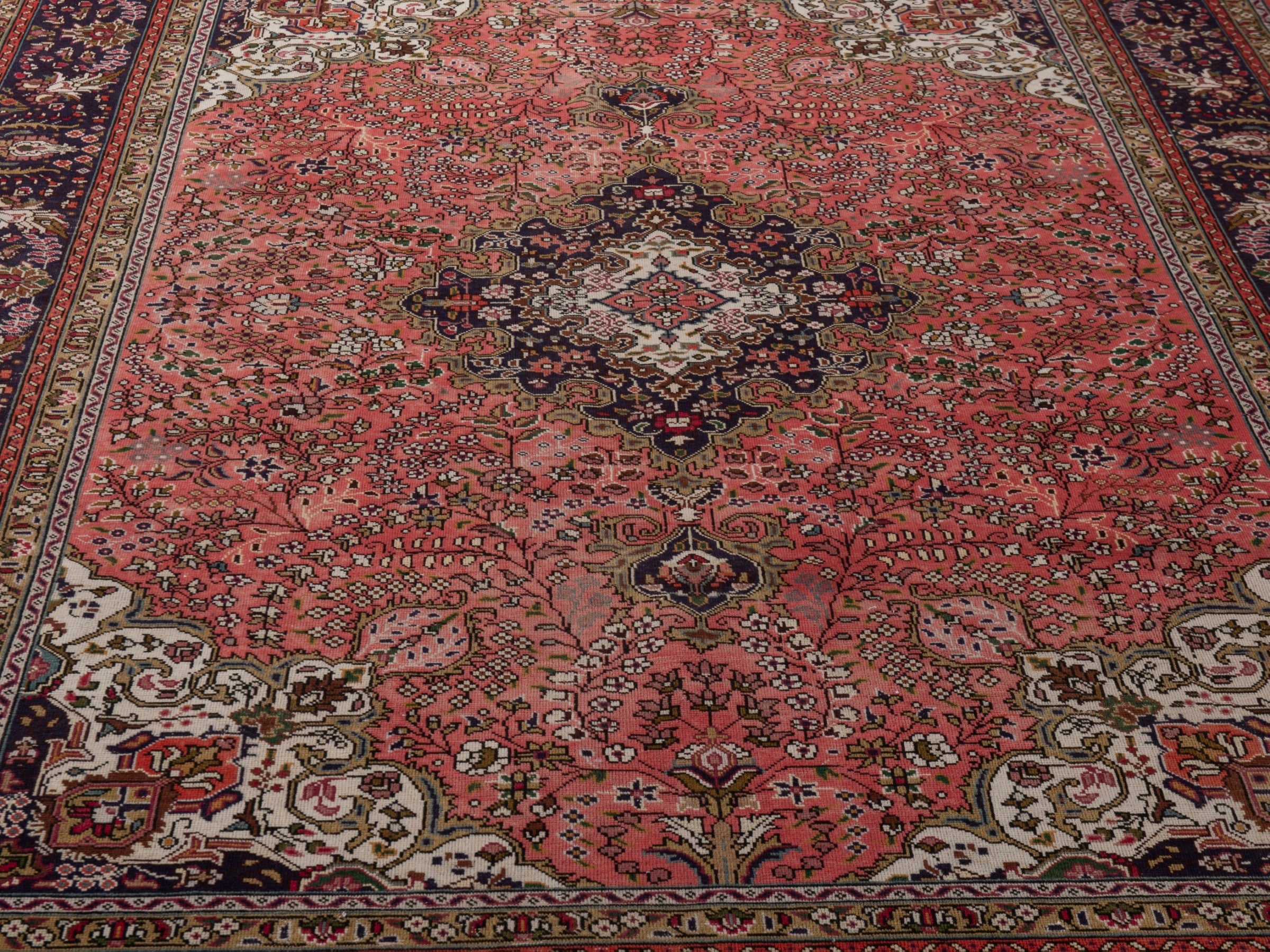 Persian Tabriz area rug in rust and navy, view 10 of 19