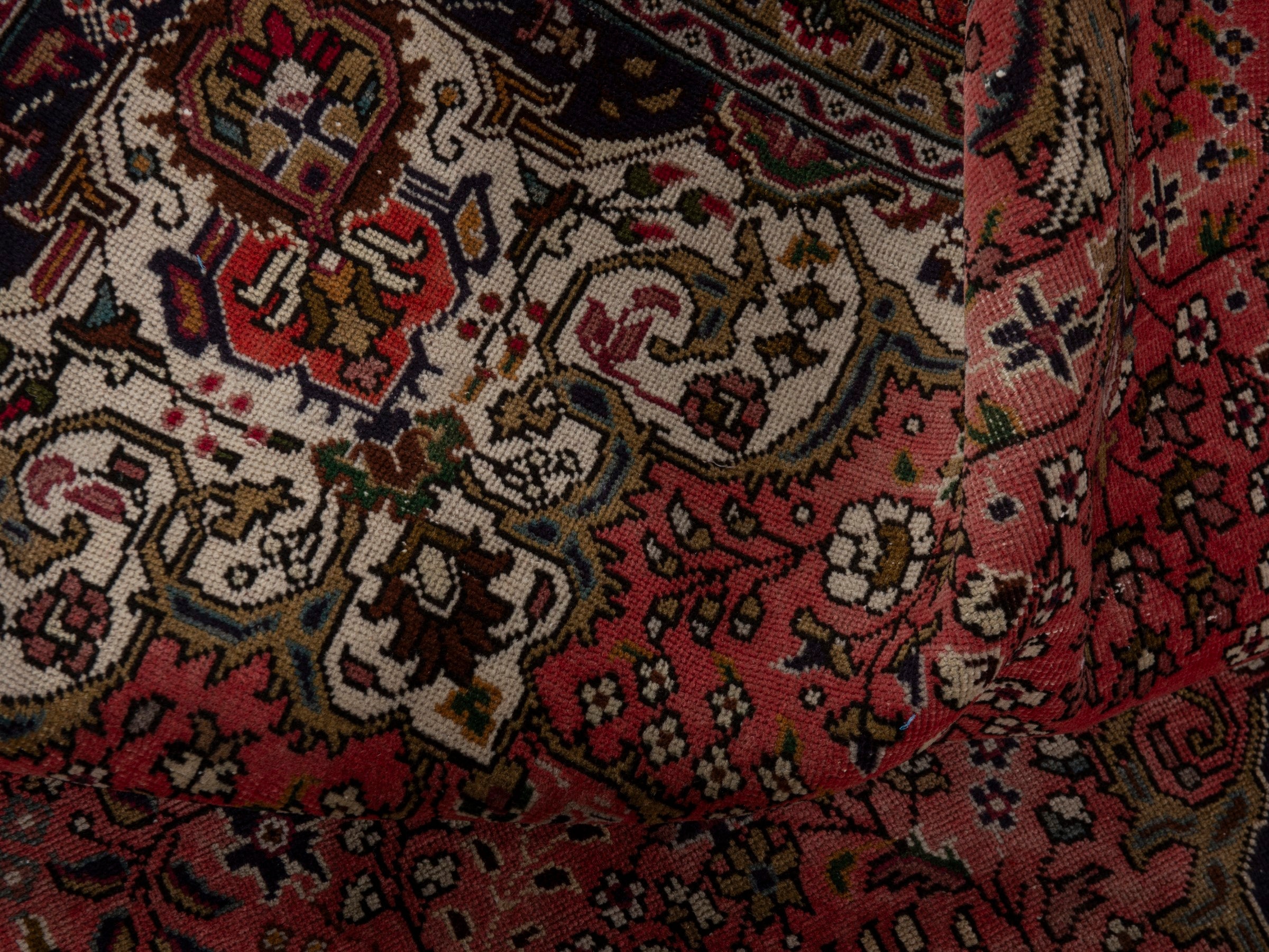 Persian Tabriz area rug in rust and navy, view 16 of 19