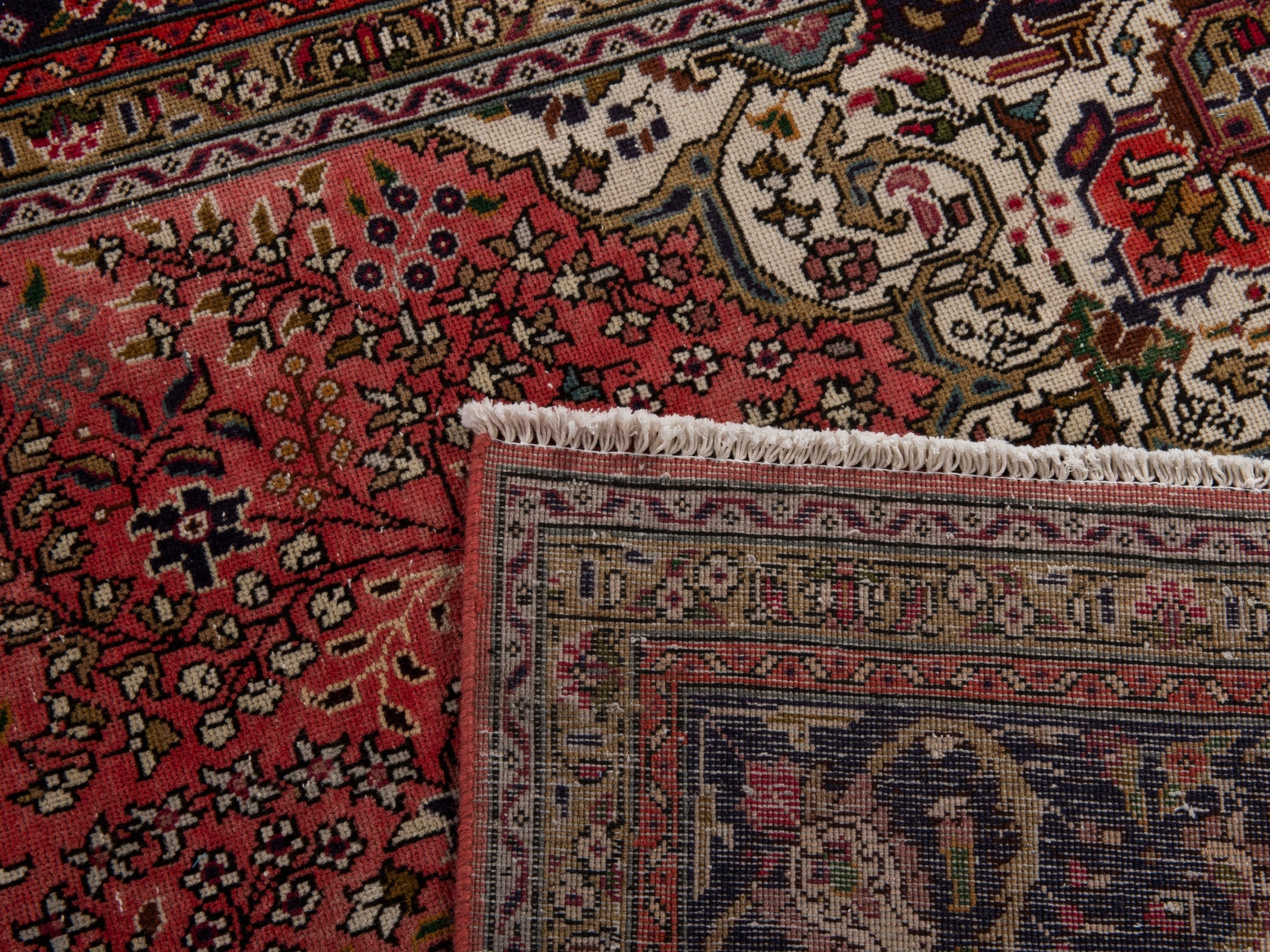 Persian Tabriz area rug in rust and navy, view 19 of 19