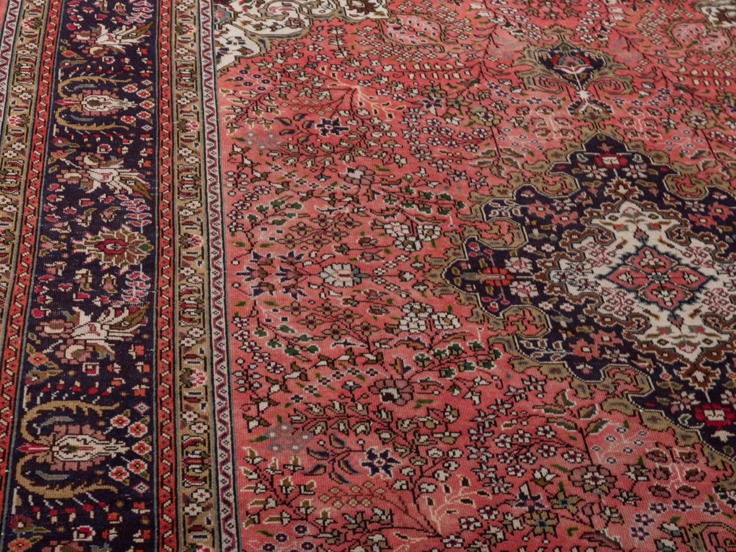 Persian Tabriz area rug in rust and navy, view 7 of 19