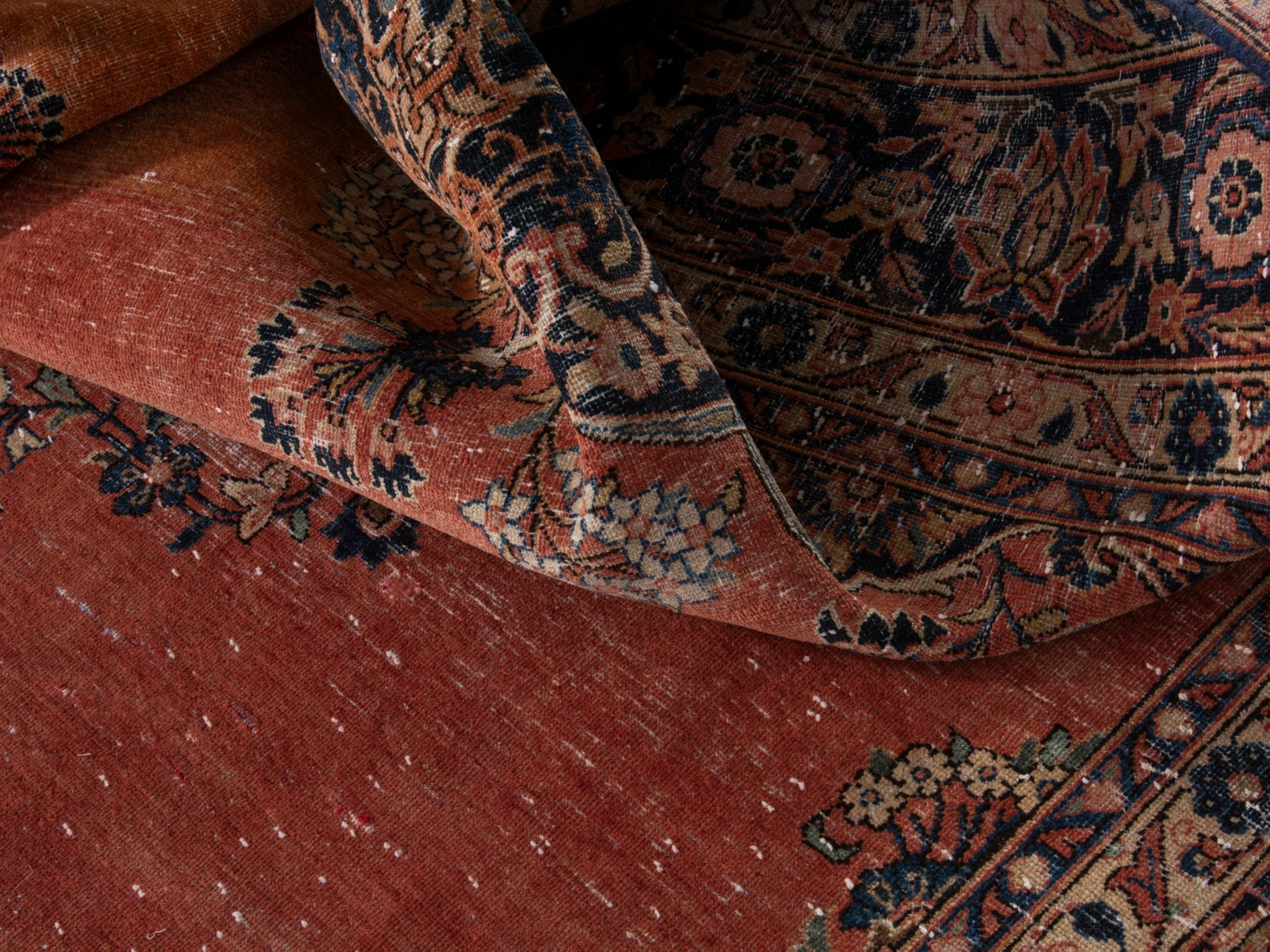 Persian Kashan oversized rug in rust and navy, view 17 of 20
