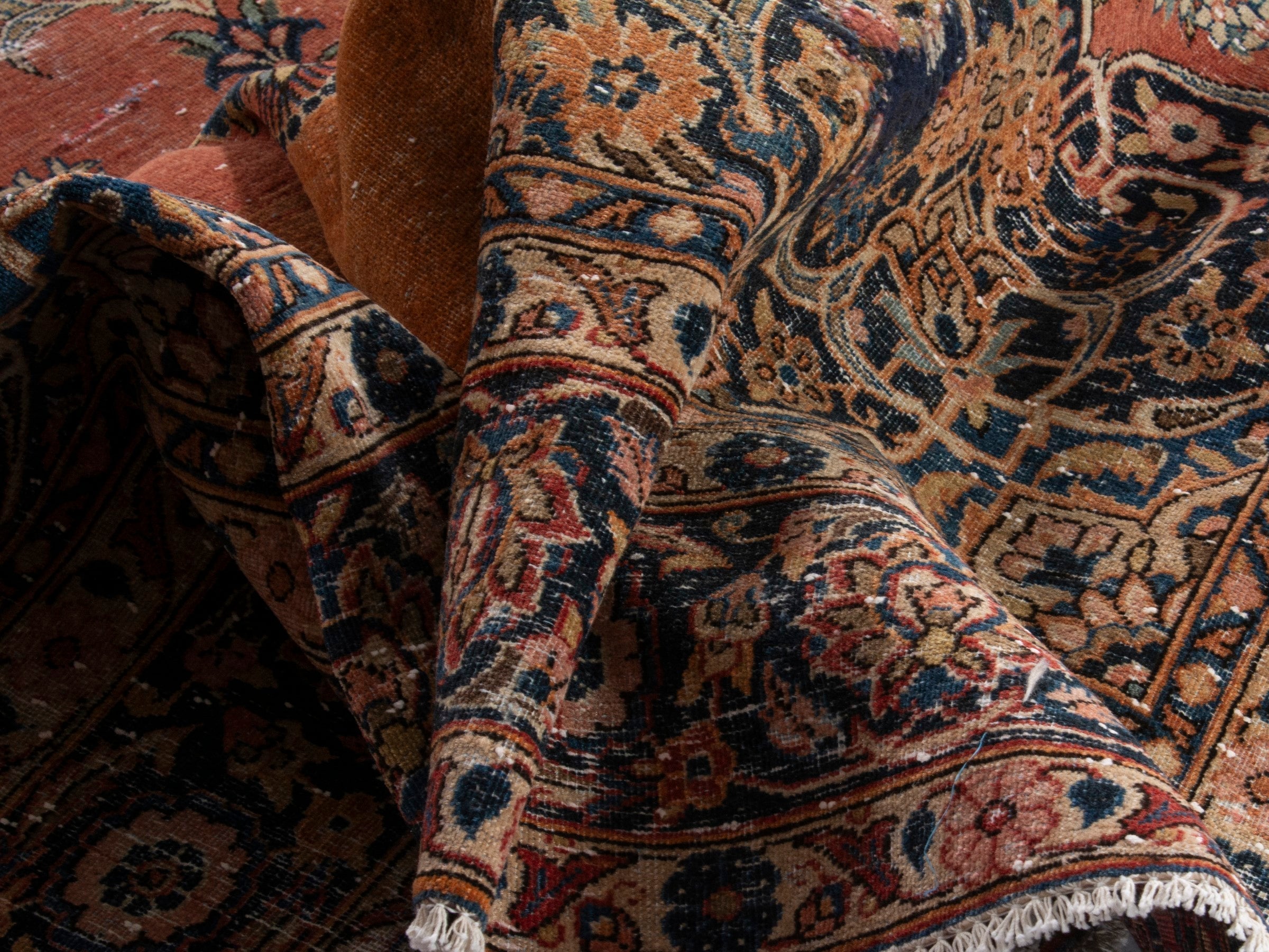 Persian Kashan oversized rug in rust and navy, view 18 of 20
