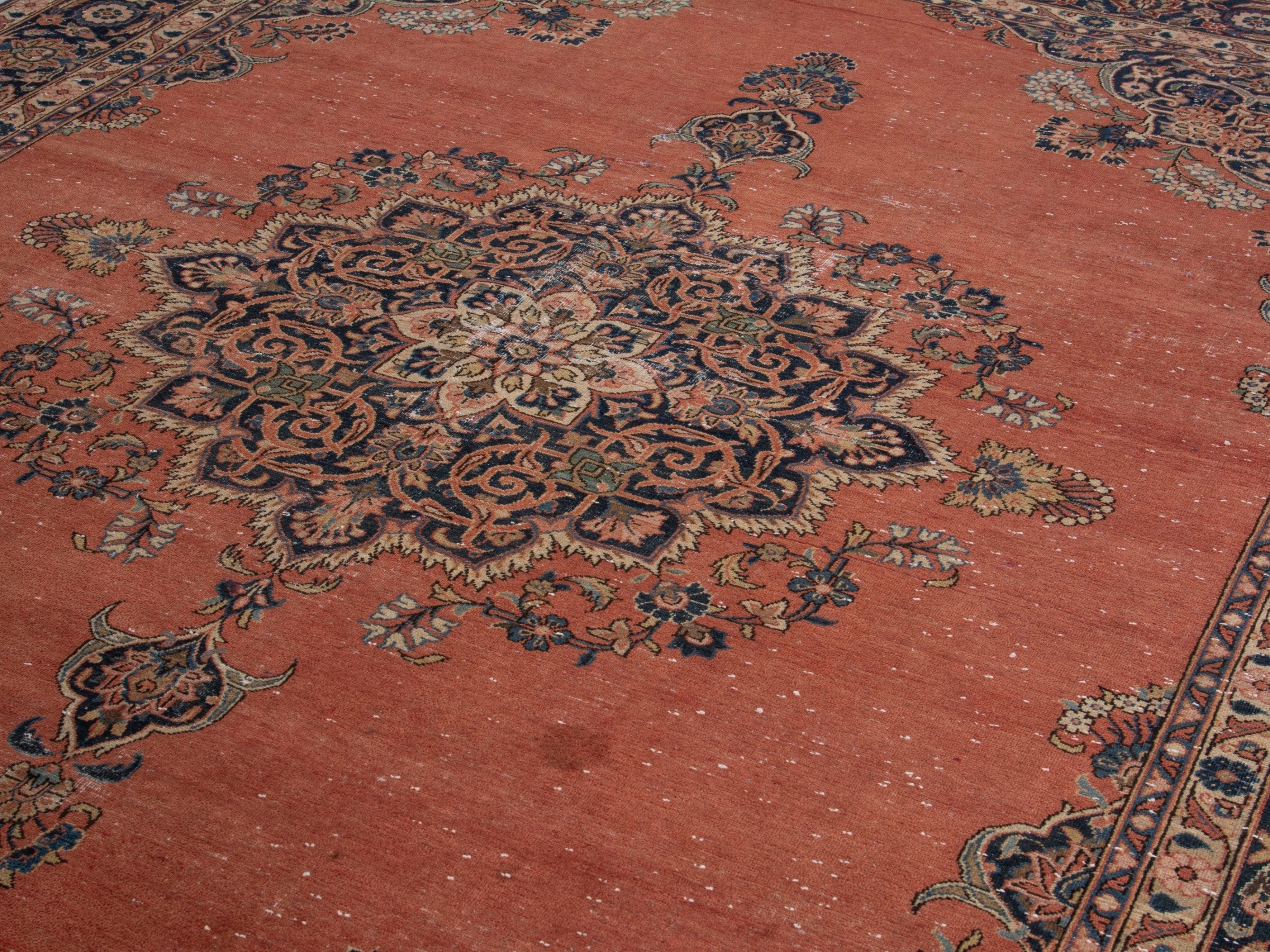 Persian Kashan oversized rug in rust and navy, view 9 of 20