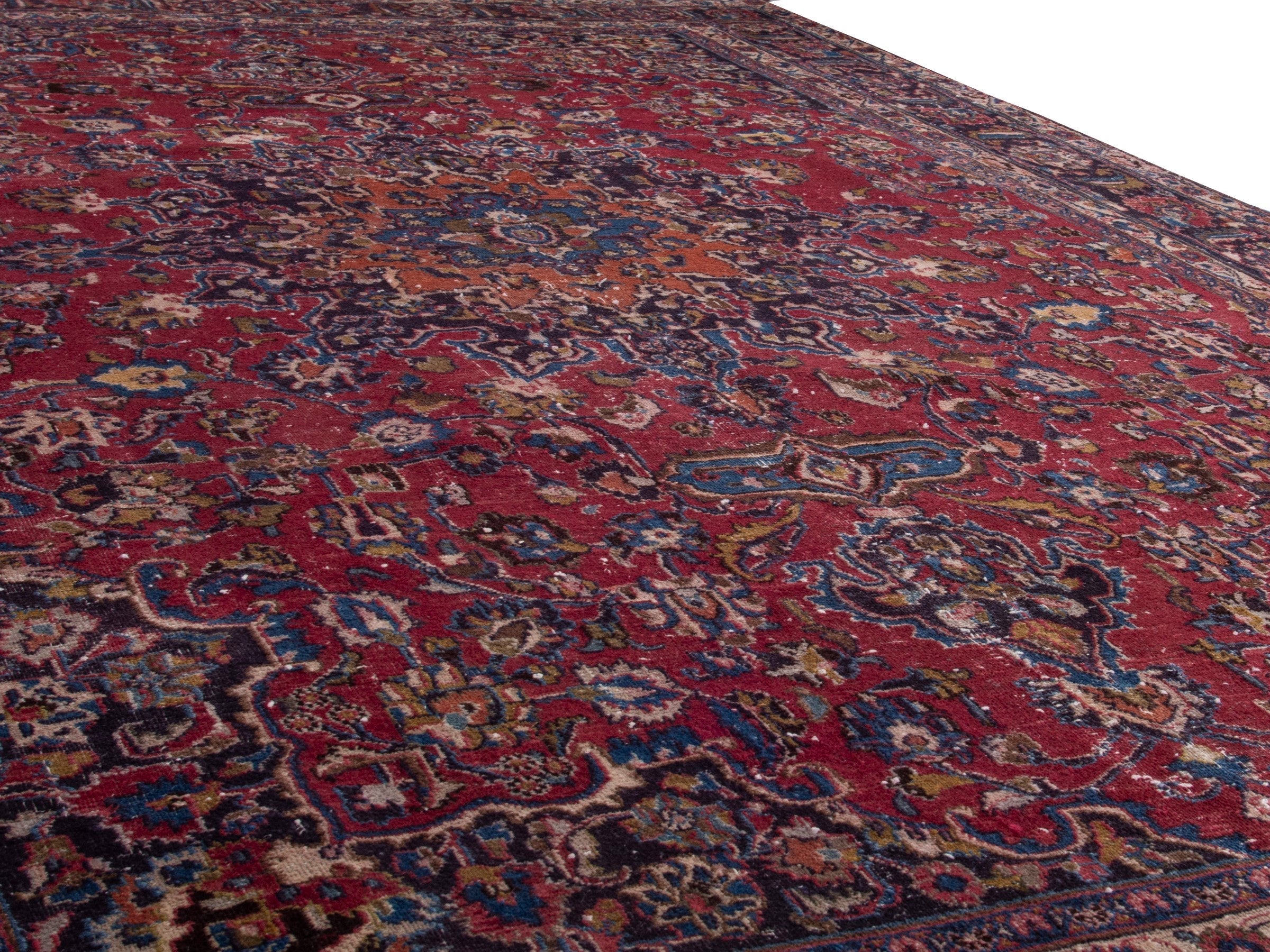 Persian Mashhad oversized rug in burgundy and navy, view 10 of 18