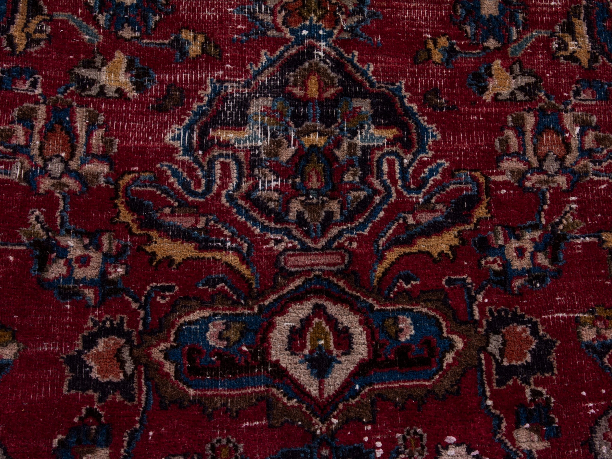 Persian Mashhad oversized rug in burgundy and navy, view 14 of 18