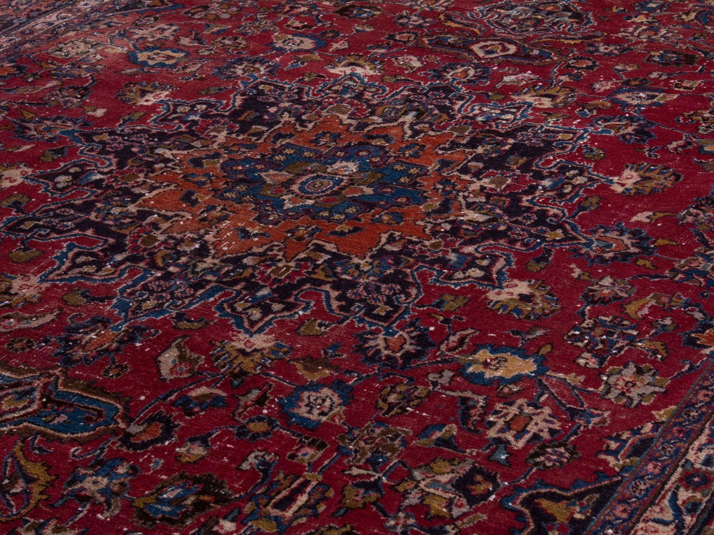 Persian Mashhad oversized rug in burgundy and navy, view 9 of 18