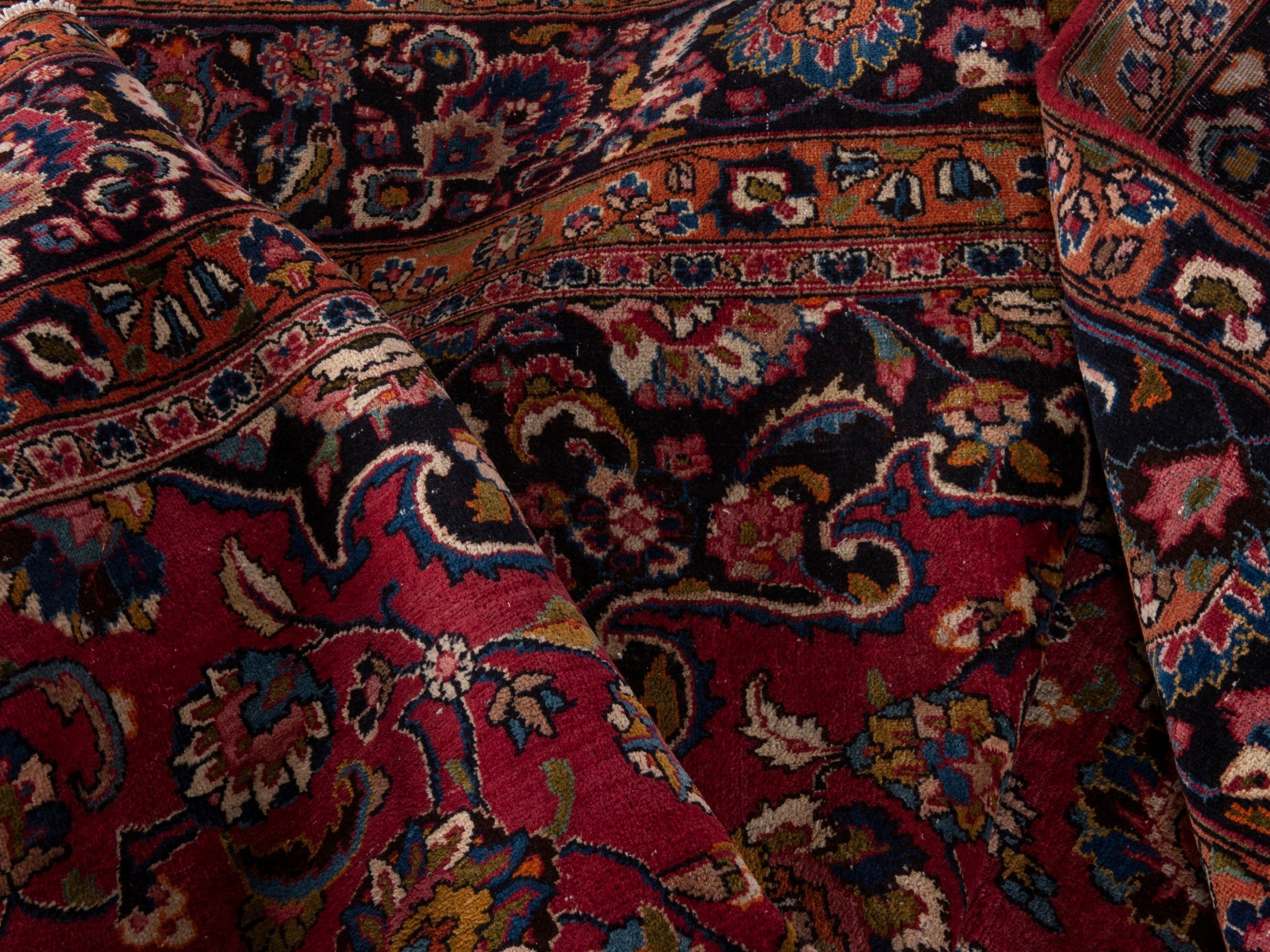 Persian Mashhad oversized rug in burgundy and navy, view 8 of 10