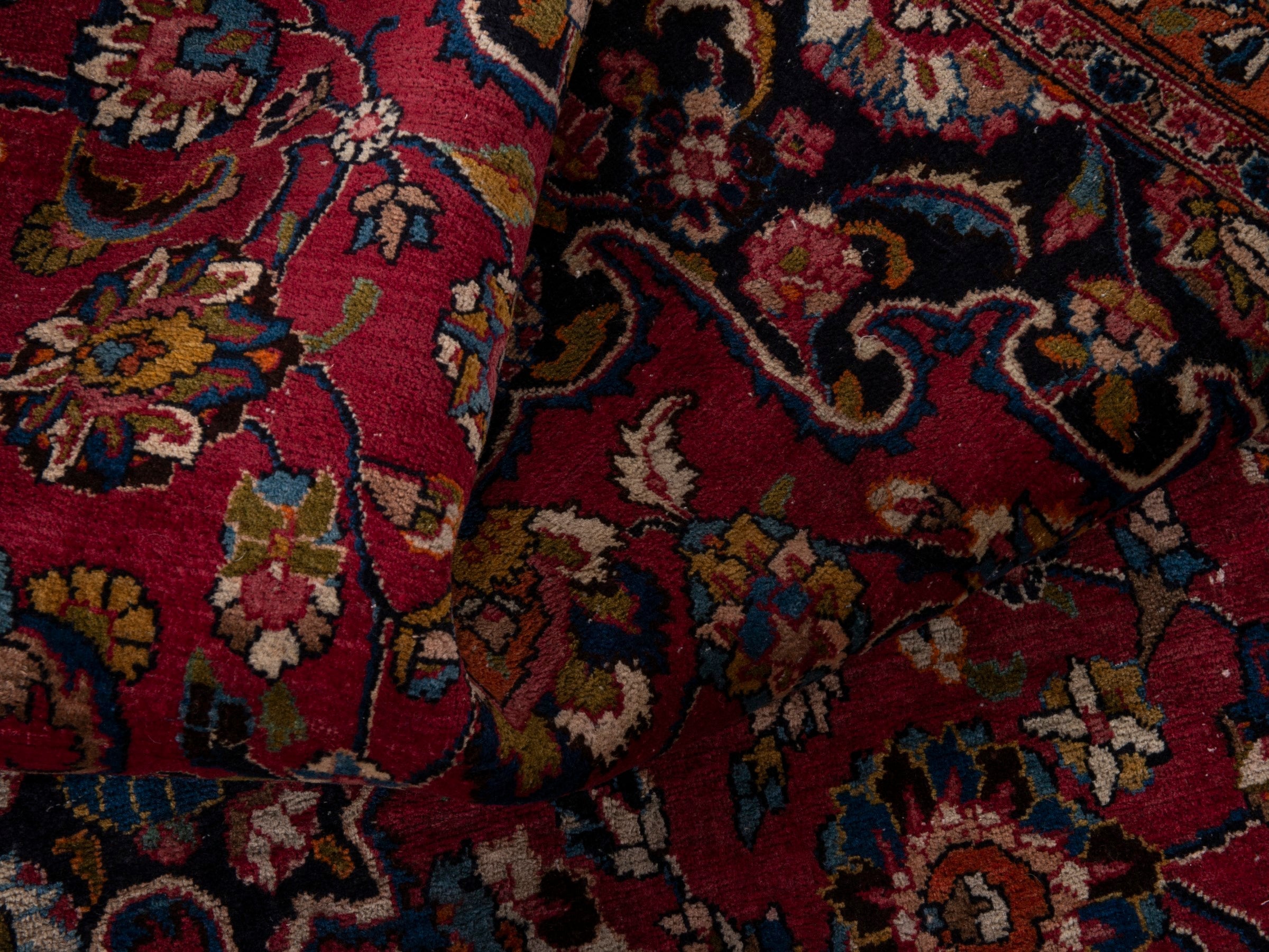 Persian Mashhad oversized rug in burgundy and navy, view 9 of 10