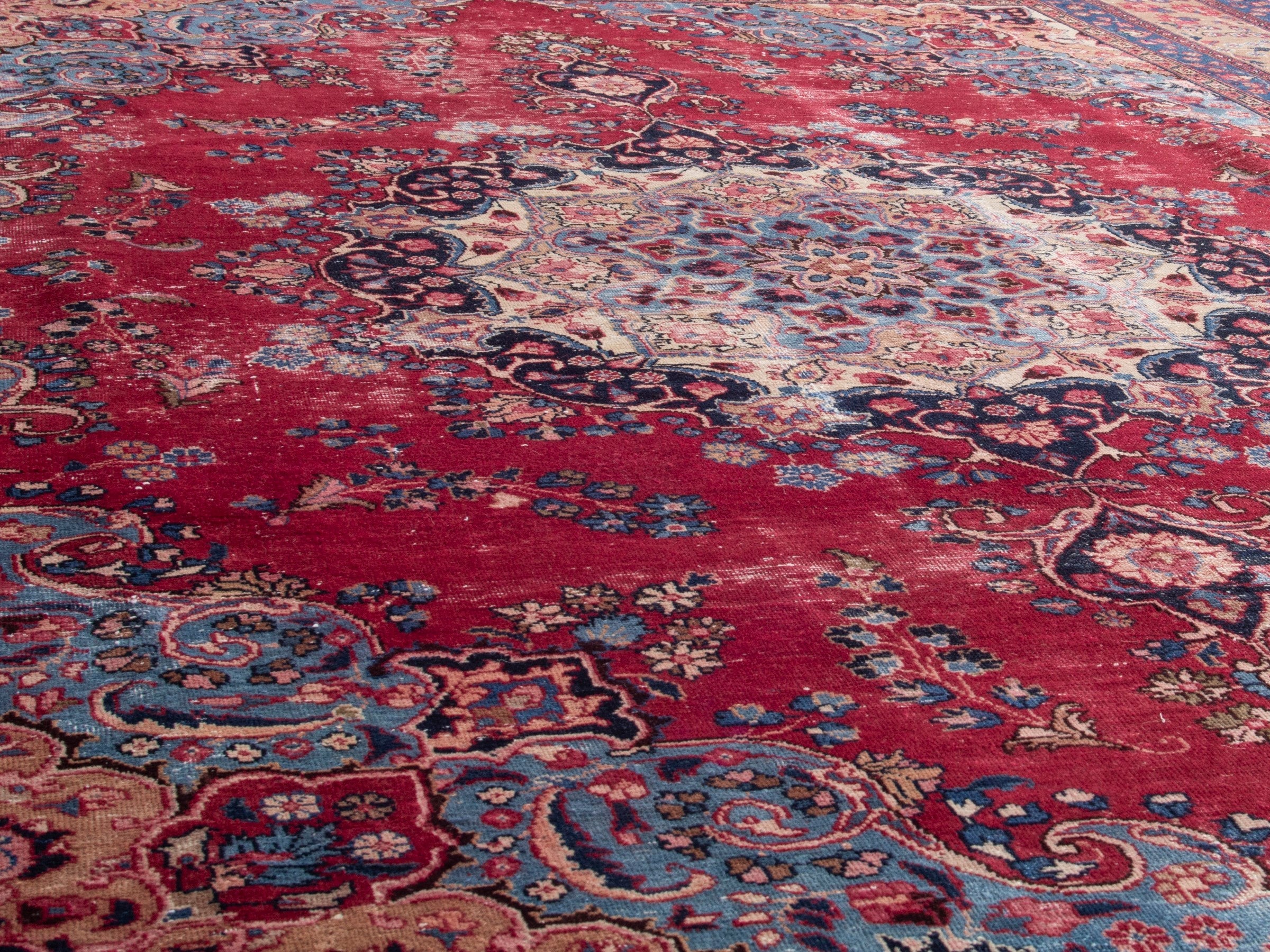 Persian Sabzevar oversized rug in deep red and navy, view 9 of 19