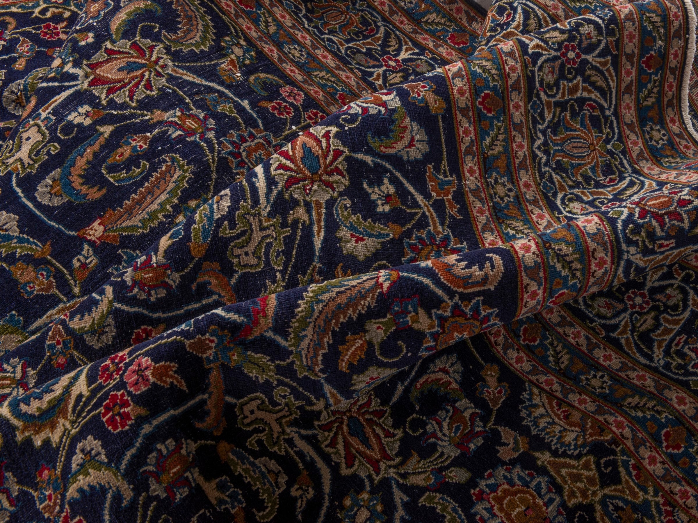 Persian Kashmar oversized rug in navy and rust, view 16 of 17