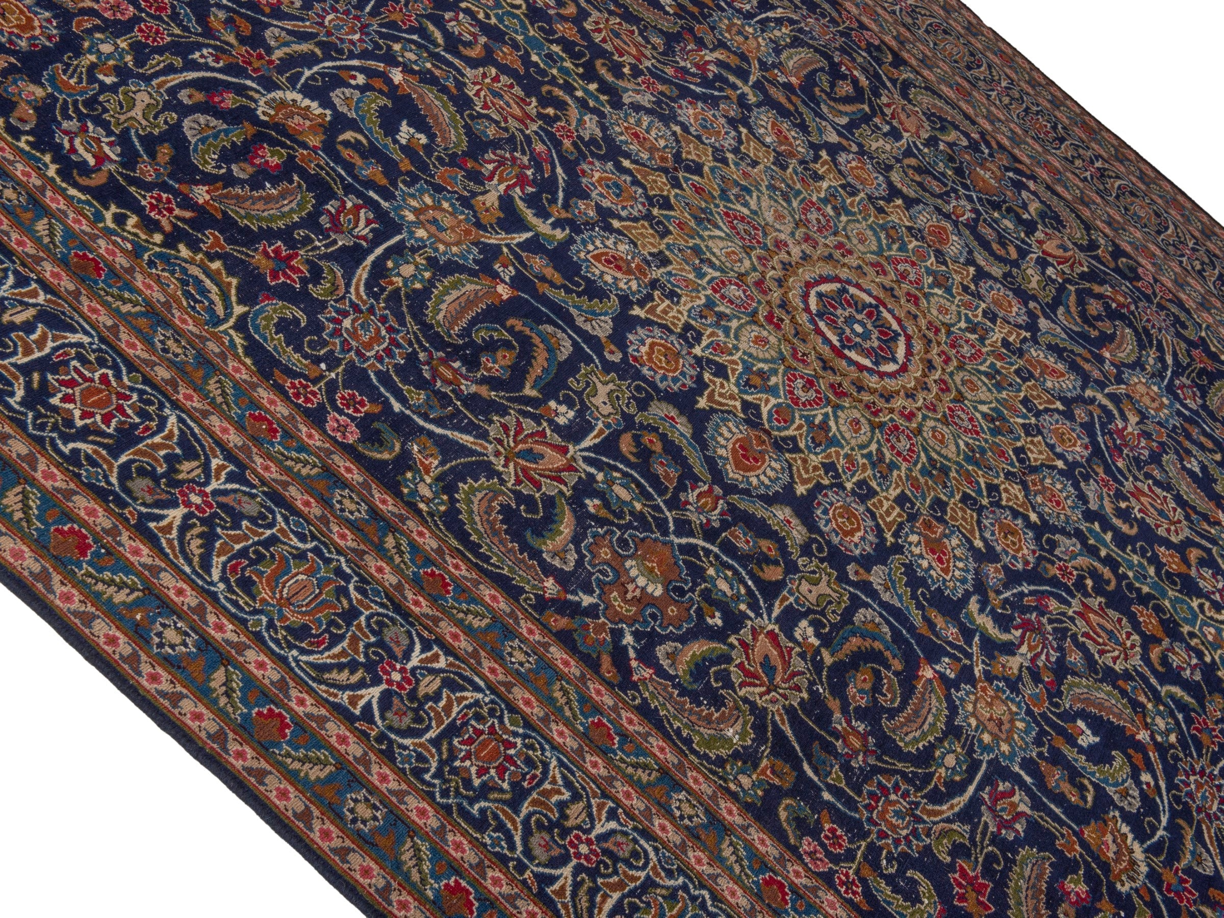 Persian Kashmar oversized rug in navy and rust, view 3 of 17